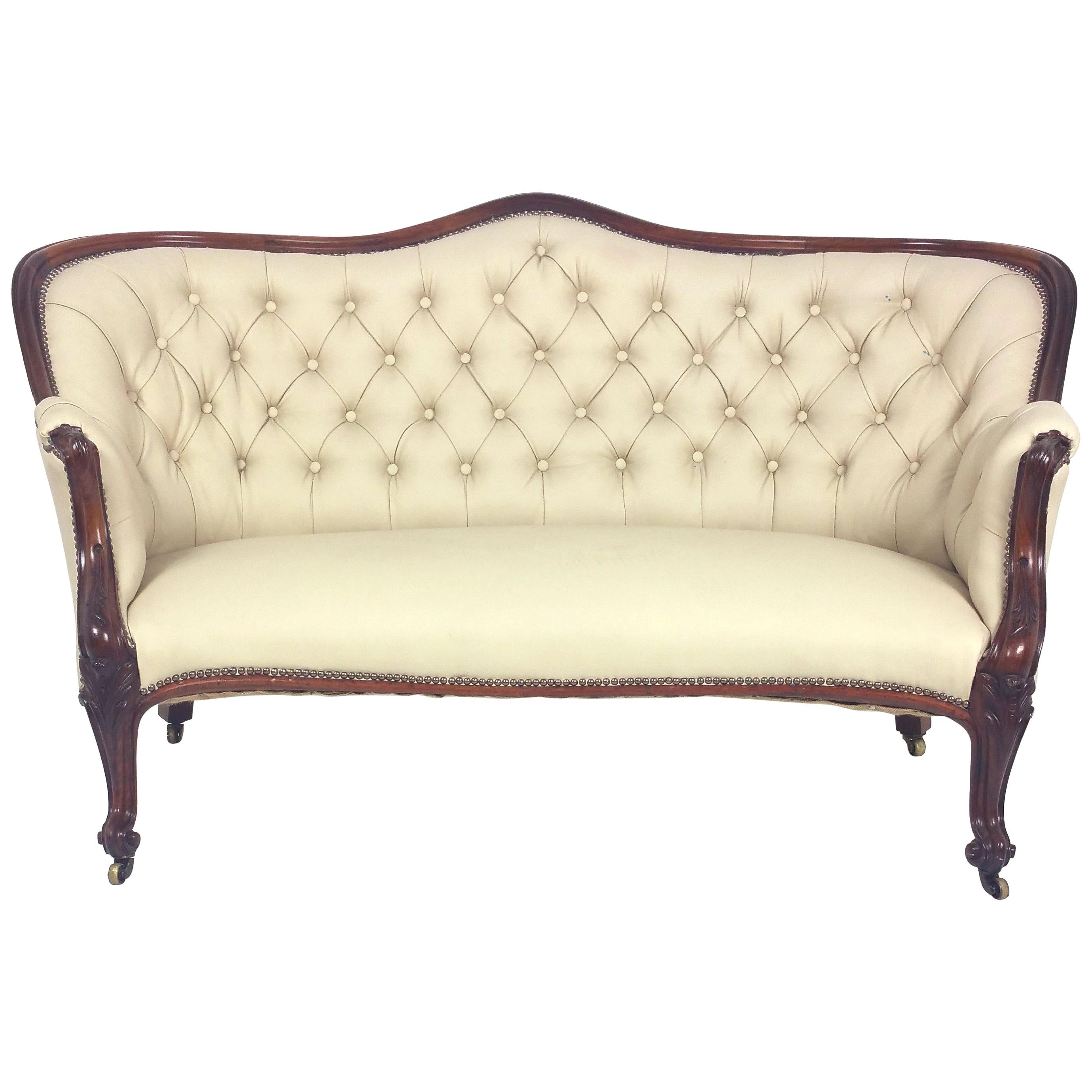 Early Victorian Carved Rosewood Leather Upholstered Sofa For Sale