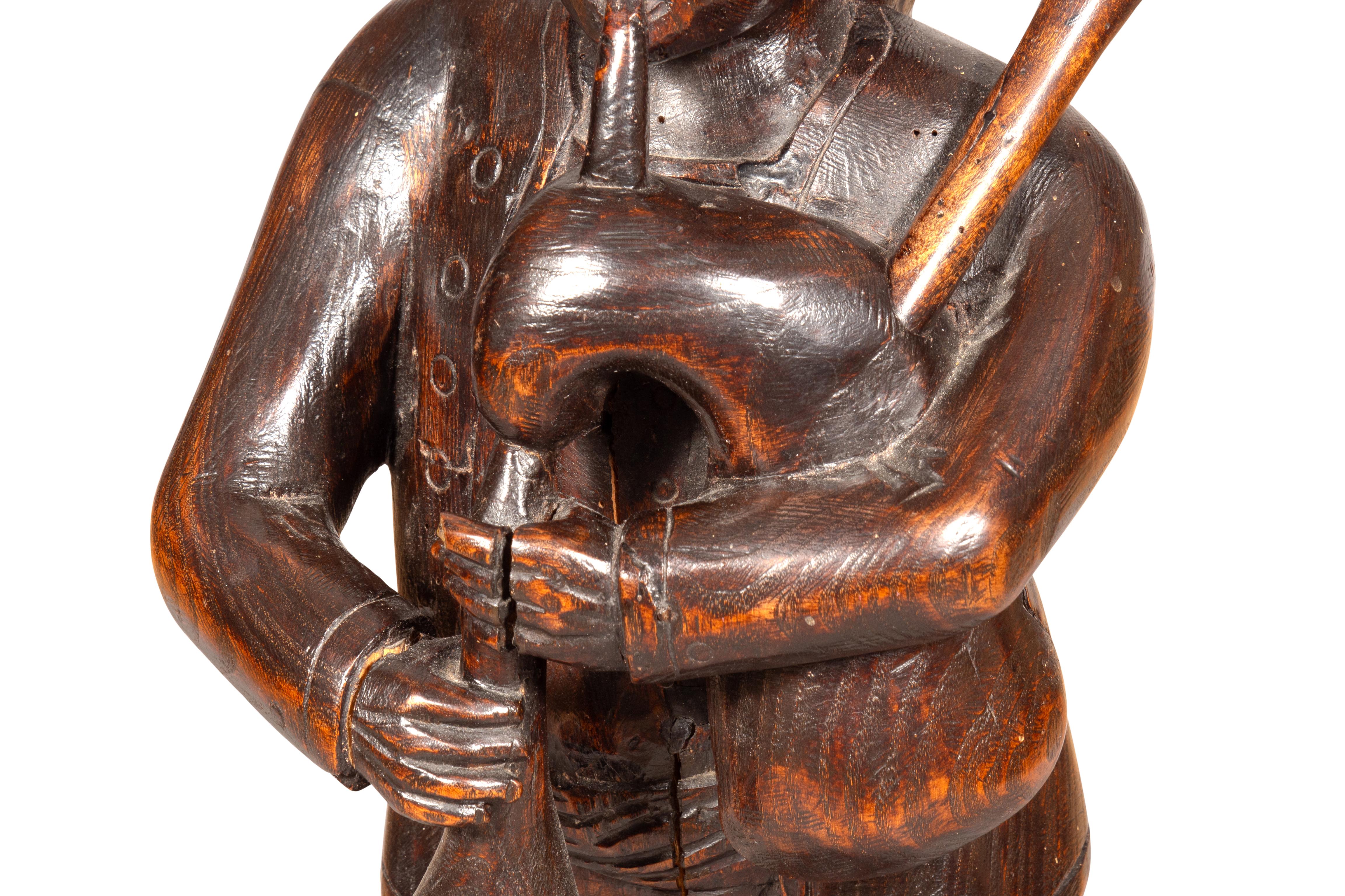 Early Victorian Carving Of A Bagpiper For Sale 4