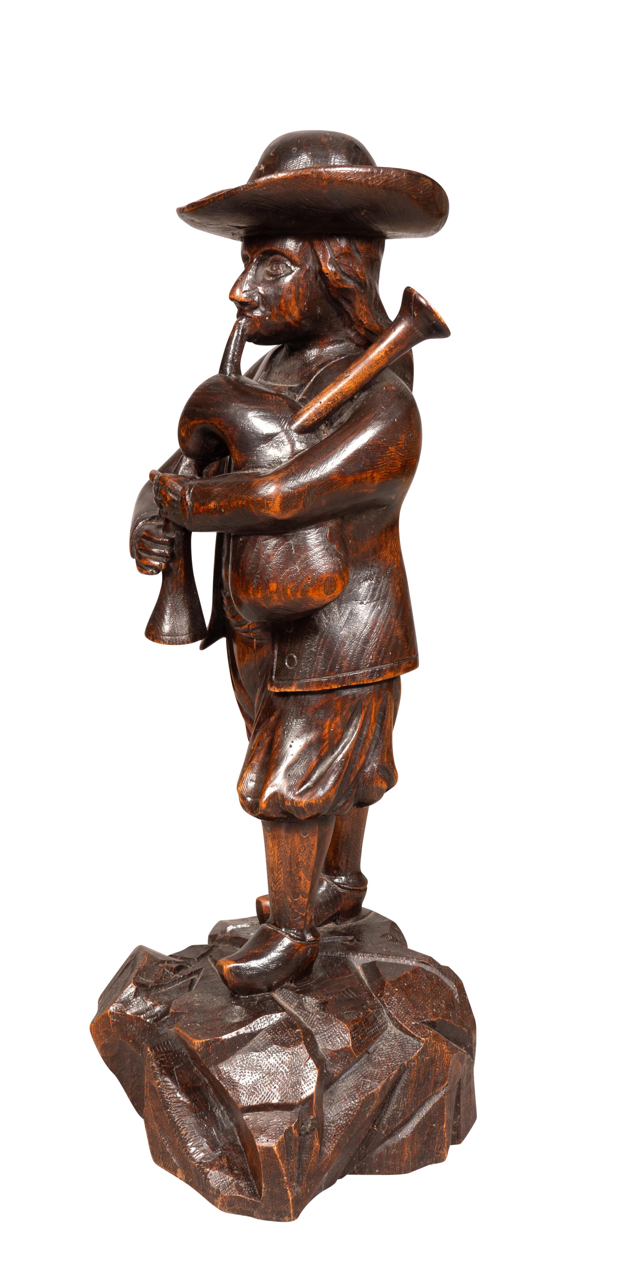 Early Victorian Carving Of A Bagpiper For Sale 1