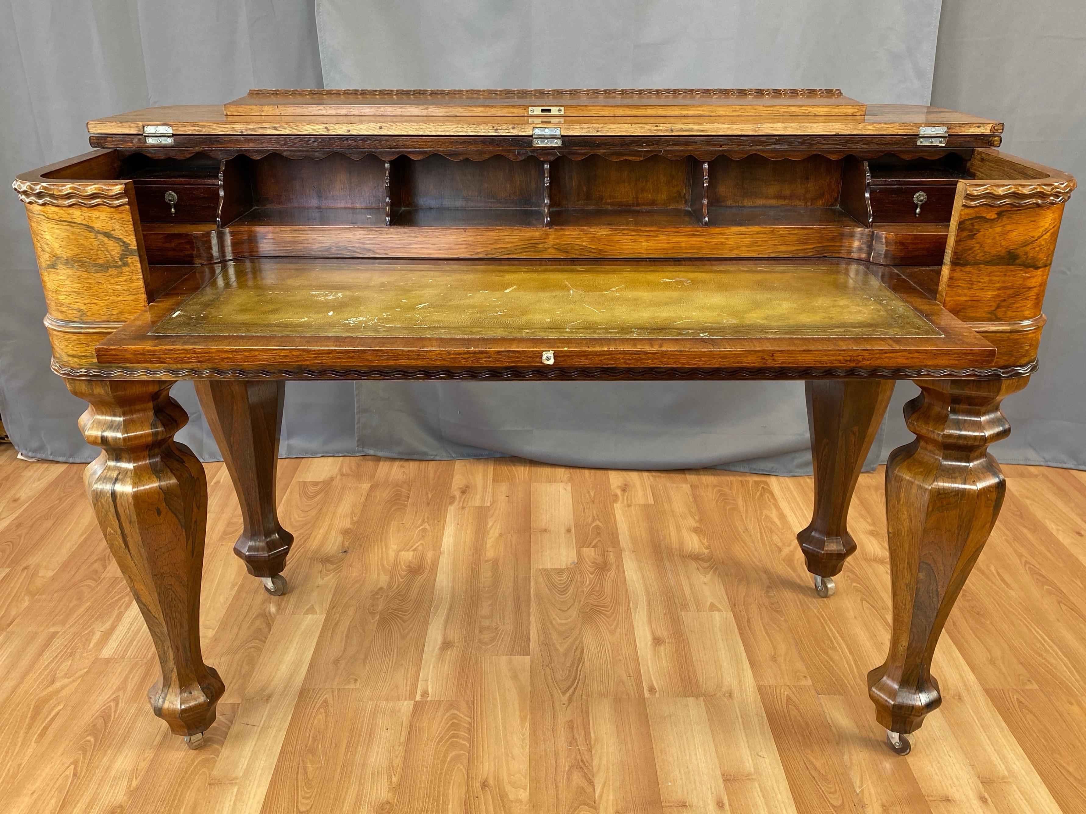 A stately and impressive early Victorian era rosewood converted melodeon flip-top desk with pull-out writing surface. Dating from the 1850s, this former musical instrument’s exceptionally well executed transition likely took place in the late 1800s