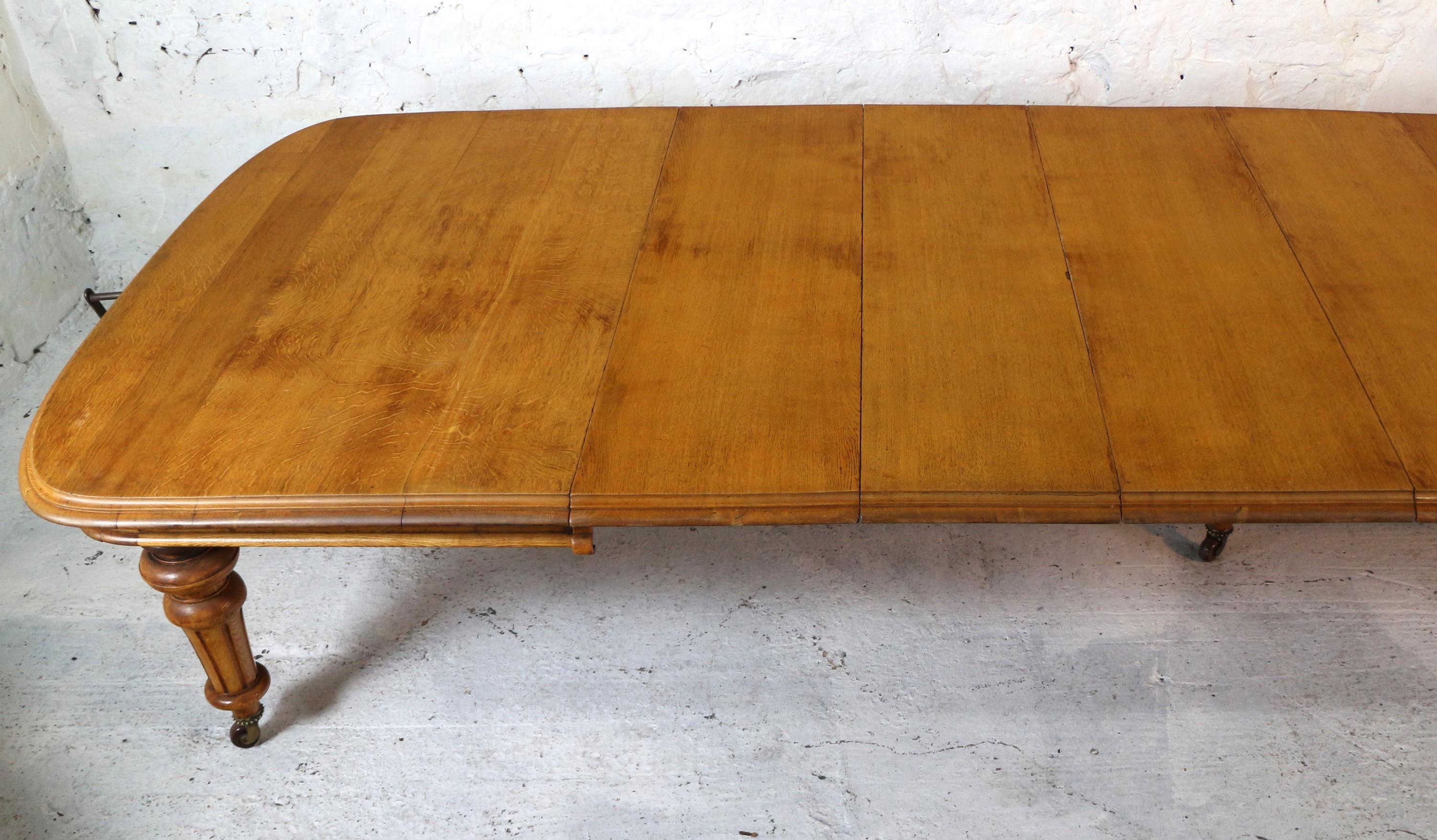 English Early Victorian Extra Wide Oak Dining Table and Six Leaves, Seats 18 For Sale