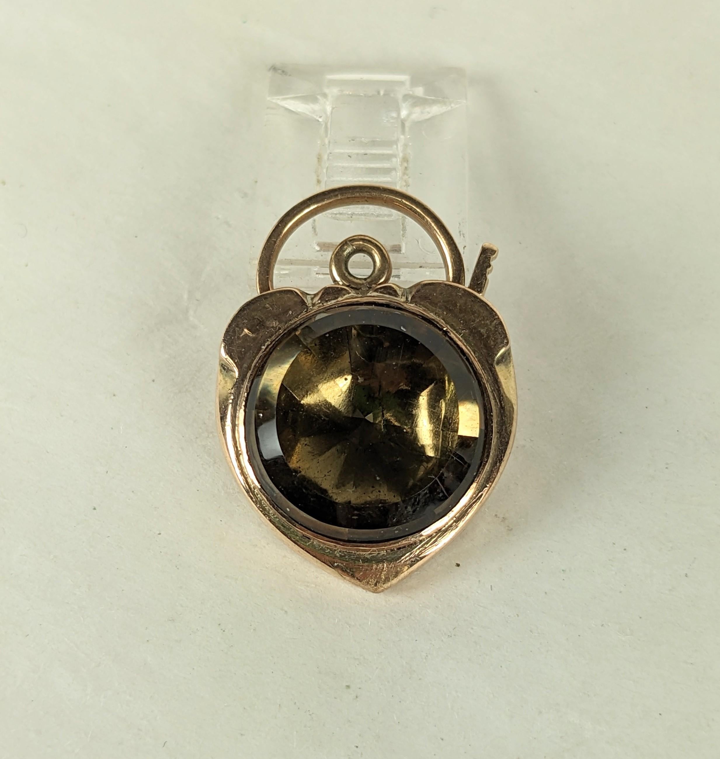 Early Victorian Foiled Gemstone Padlock in 14k gold. Flat cut citrine or topaz set in foil back setting. Heavy gold setting with working padlock for use as clasp. 1
