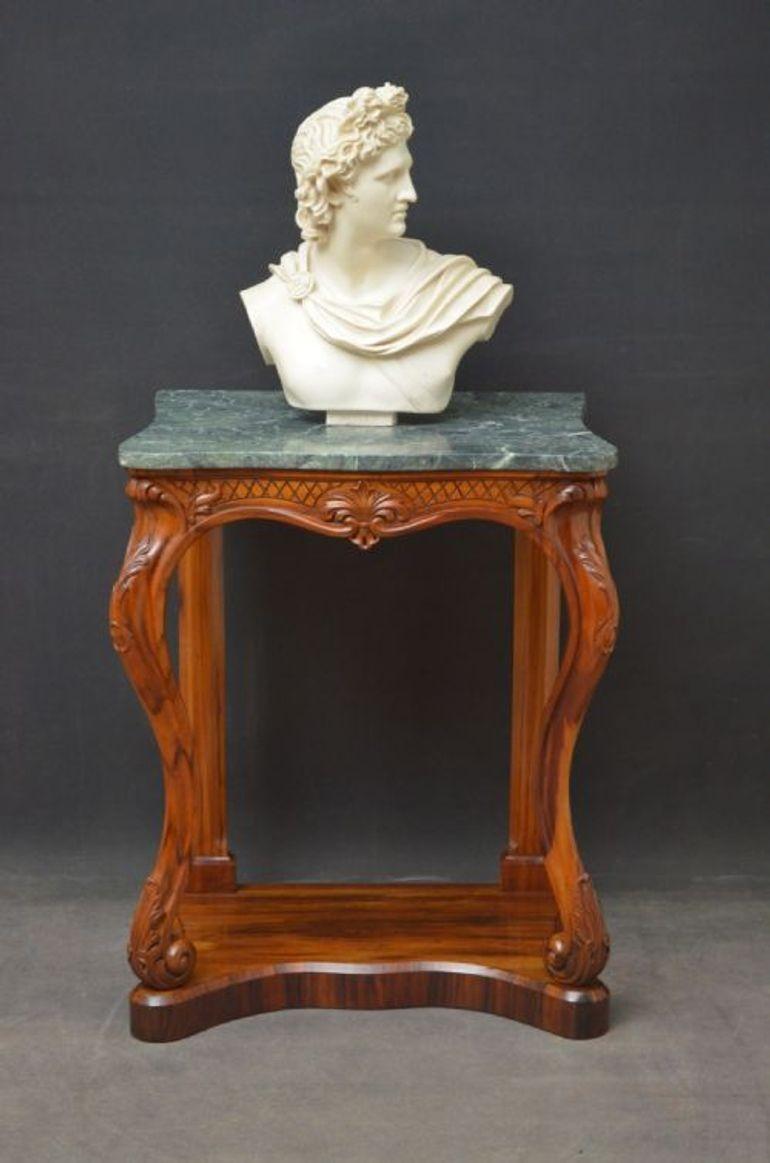 Sn4605 Exceptional Early Victorian Goncalo Alves console table of serpentine design, having green marble top above finely carved frieze, standing on canted uprights to the back and finely carved cabriole legs to the front terminating in platform