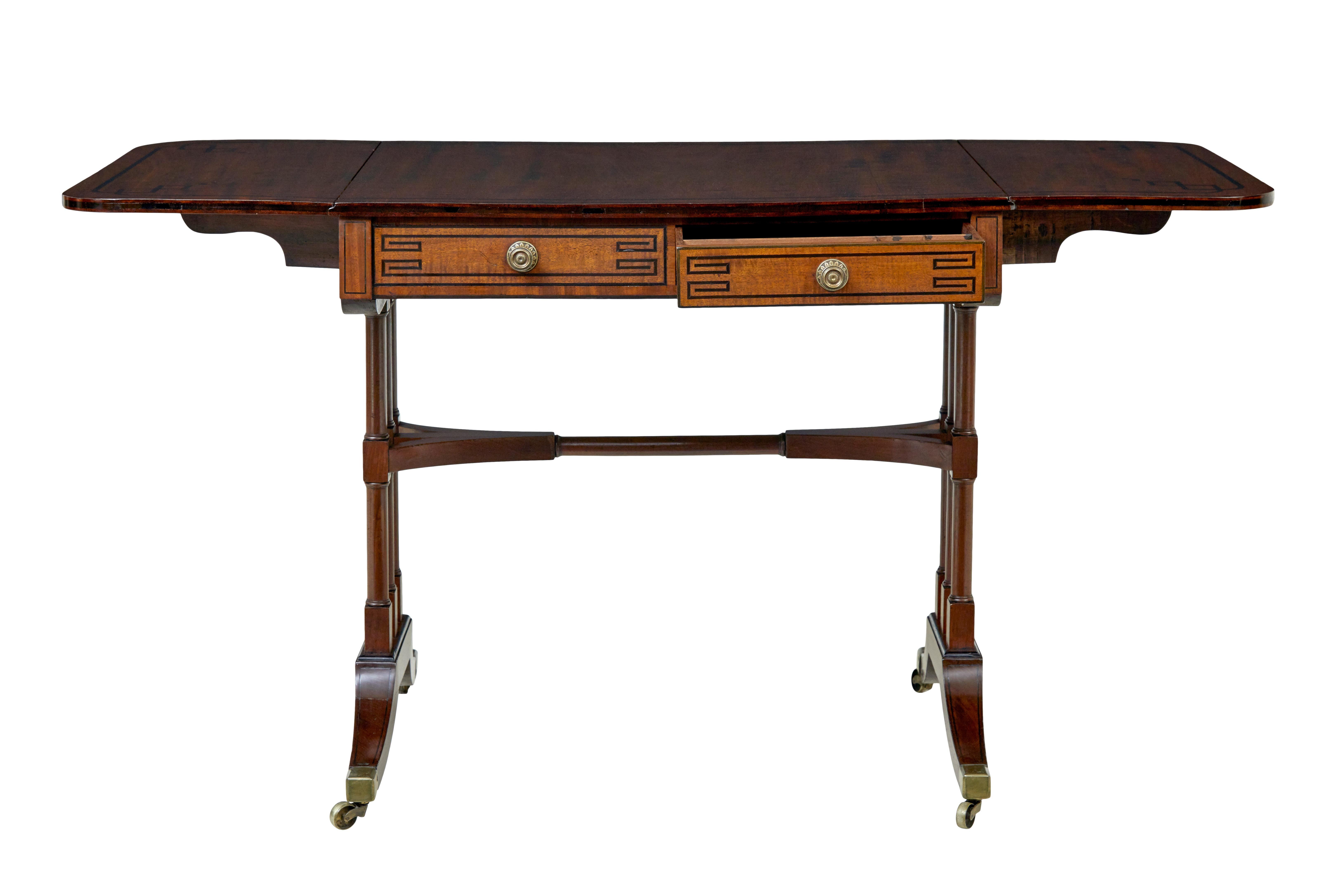 Hand-Carved Early Victorian inlaid mahogany sofa table For Sale