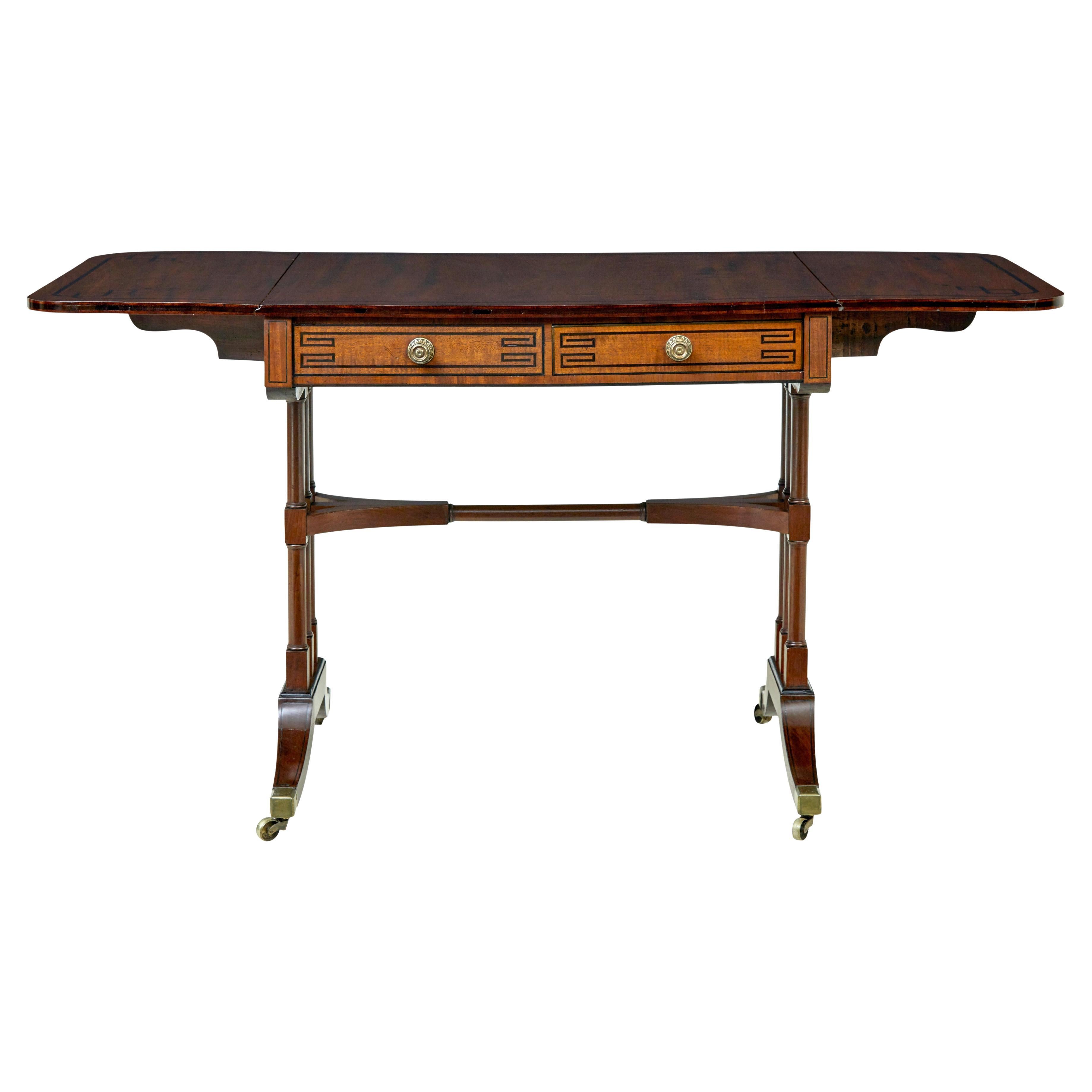 Early Victorian inlaid mahogany sofa table For Sale