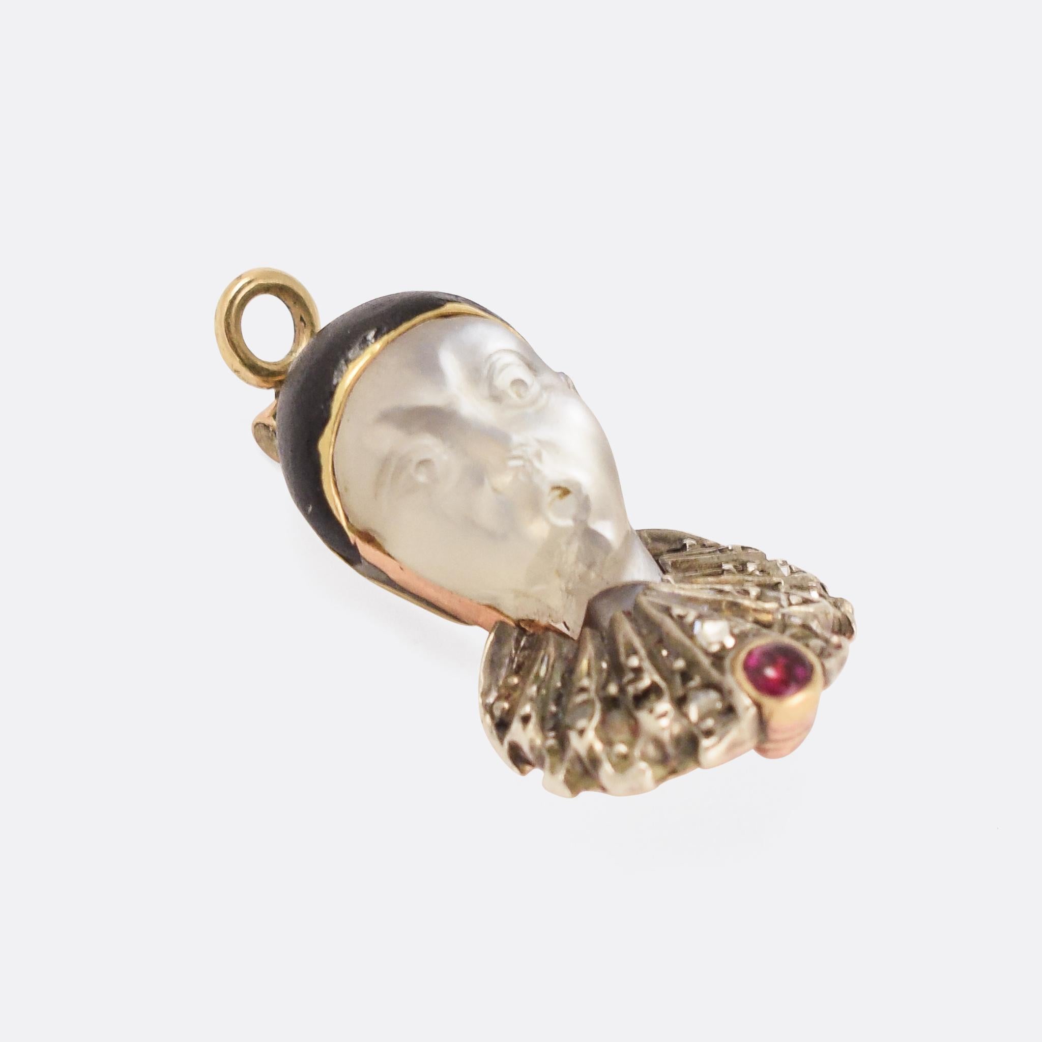 An exceptional early Victorian moonstone Pierrot pendant dating from the 1850s. Pierrot is a pantomime character whose origins are in the late seventeenth-century Italian troupe of players performing in Paris and known as the Comédie-Italienne.
