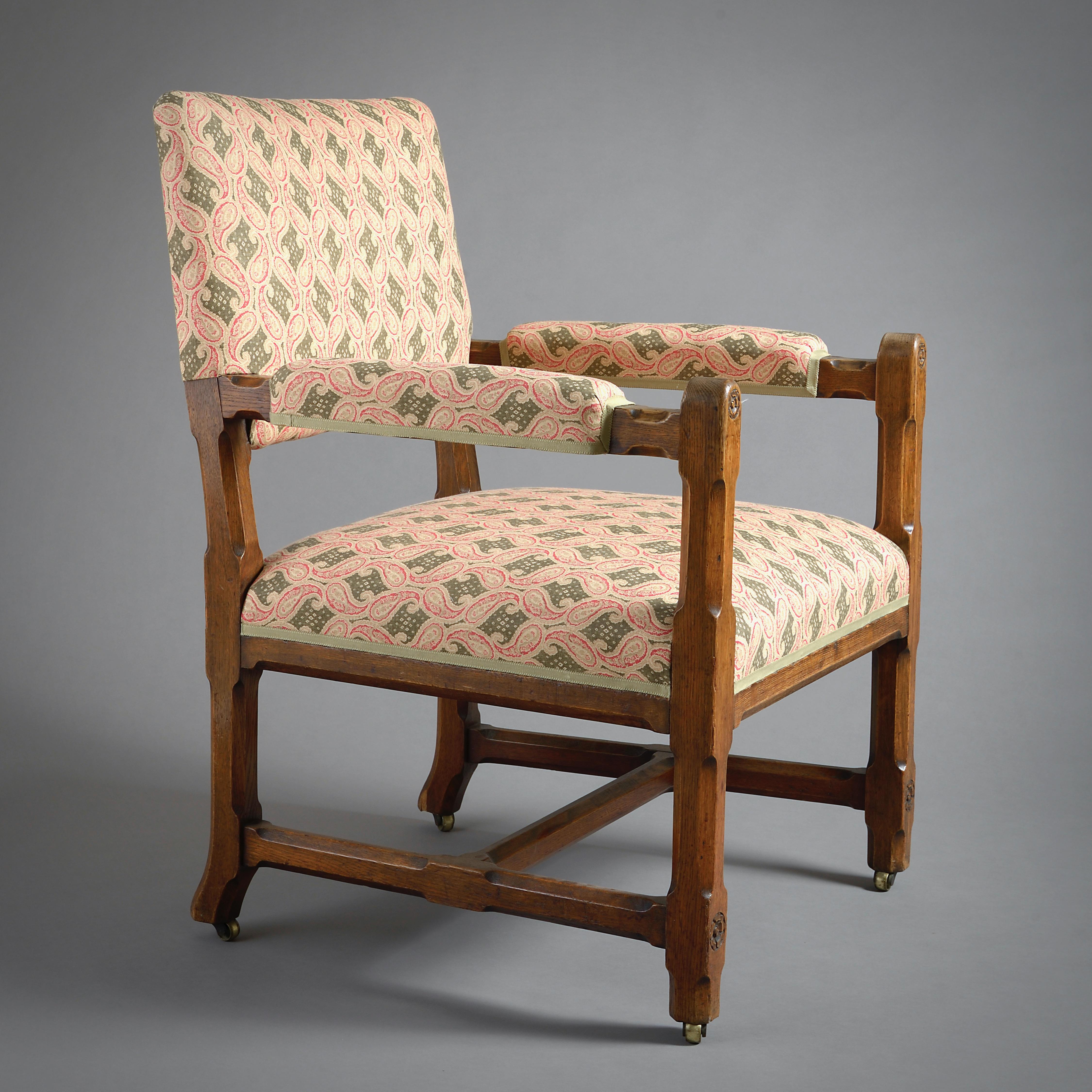 UNA POLTRONA IN QUERCIA DELL'ANTICO VITTORIO A MODO DI A.W.N PUGIN, CIRCA 1850.