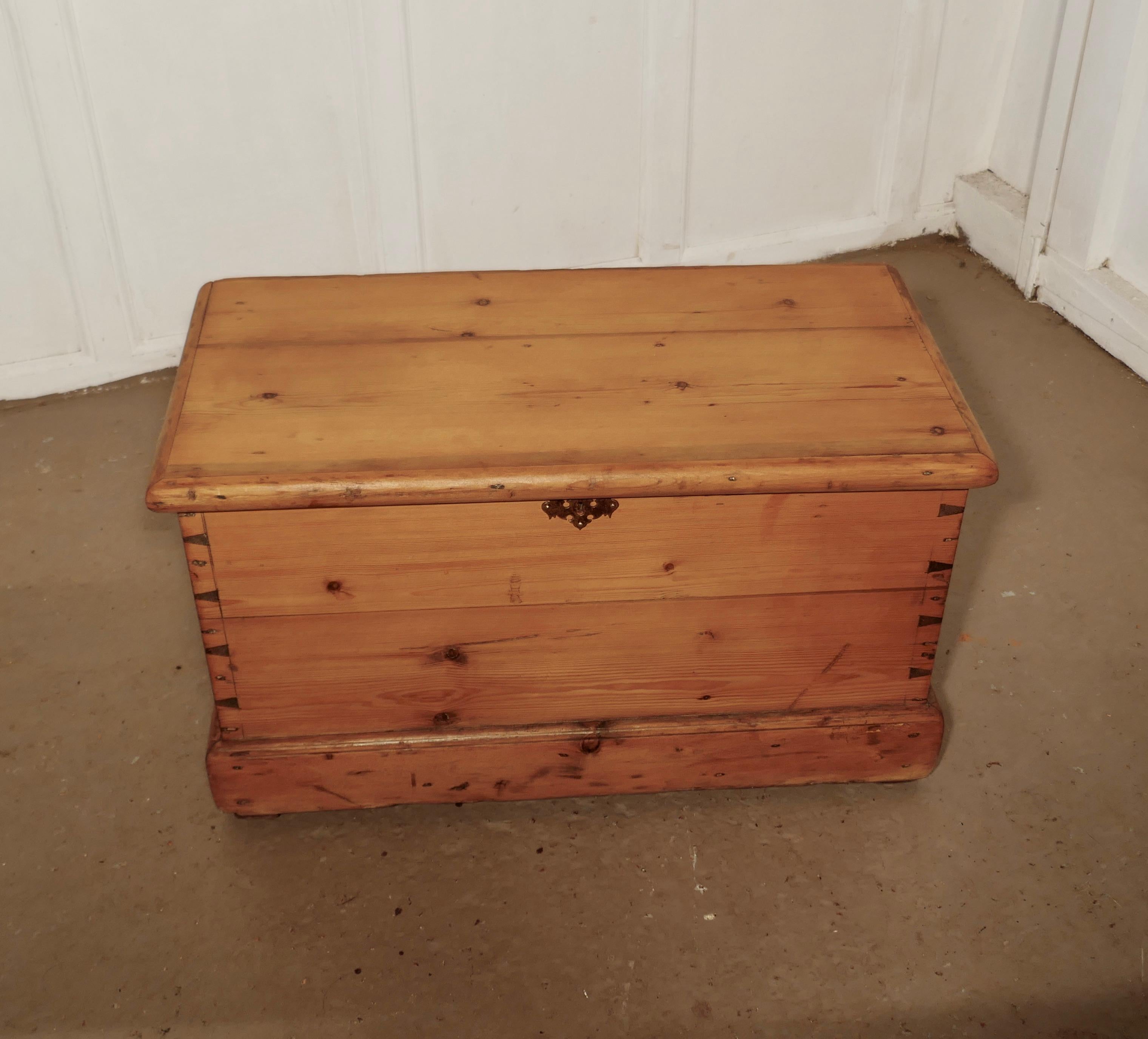 Early Victorian pine chest, blanket box or coffee table


This is a very good heavy quality box made in 1” thick pine, it has an open candle box with a secret drawer concealed behind a sliding panel, blacksmith made iron strap hinges and carrying