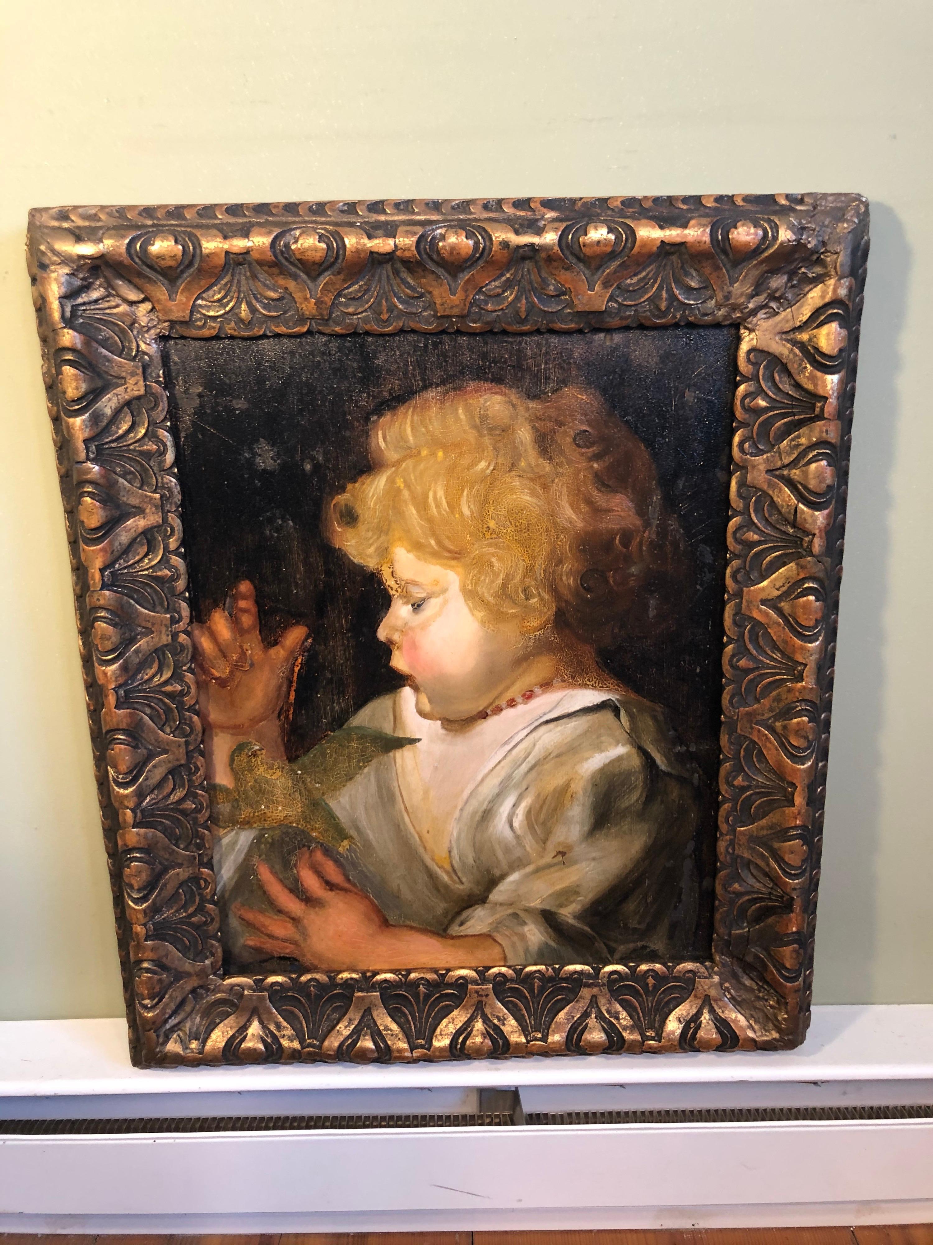 Early Victorian portrait of a child with bird. Heavy paint with some crackling. Oil on board with thick carved gesso frame. Hand painted, unsigned.