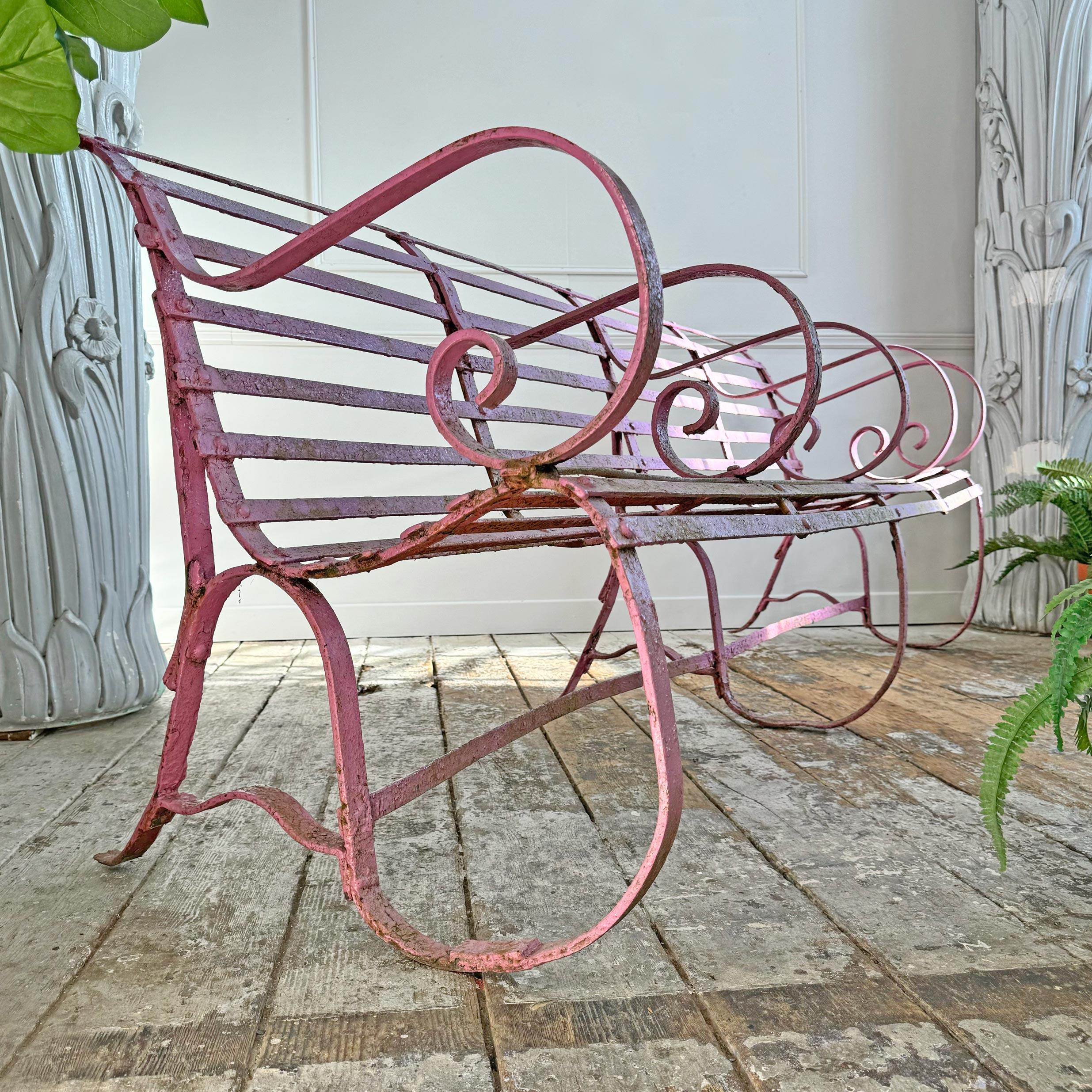 Pretty In PINK!



A one of a kind 4 seat early Victorian scroll arm bench, dating to the early 1800's, this stunning later Regency / Early Victorian heavy strapwork iron bench is painted in the most brilliant soft pink/ lilac paint, unsure when