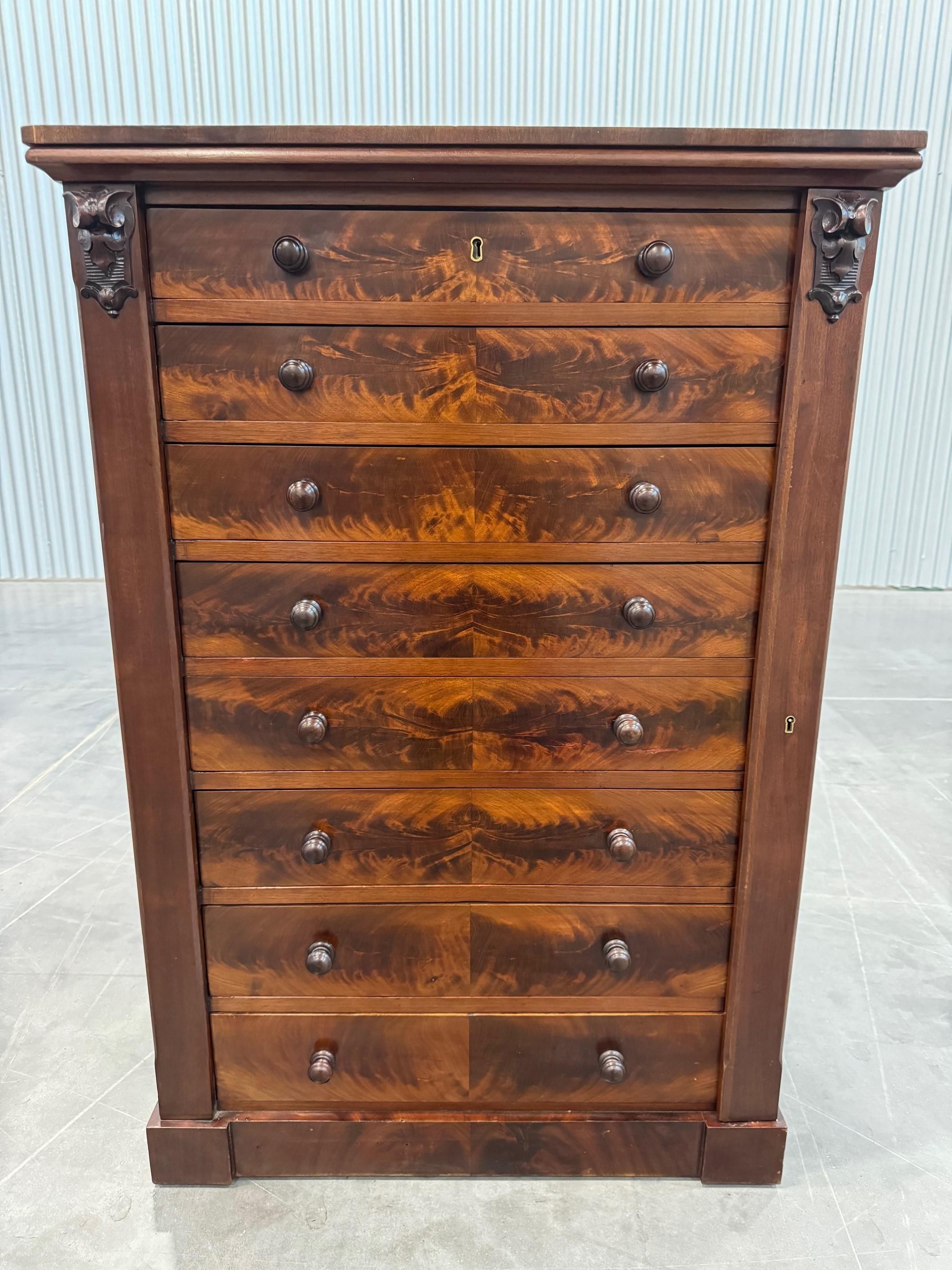 A wonderful  Victorian Wellington Chest Circa 1850 
With eight graduated ash lined drawers, hinged locking arm to the right.
 The Wellington Chest was named aptly after the Duke of Wellington these chests were tall and narrow and usually with seven