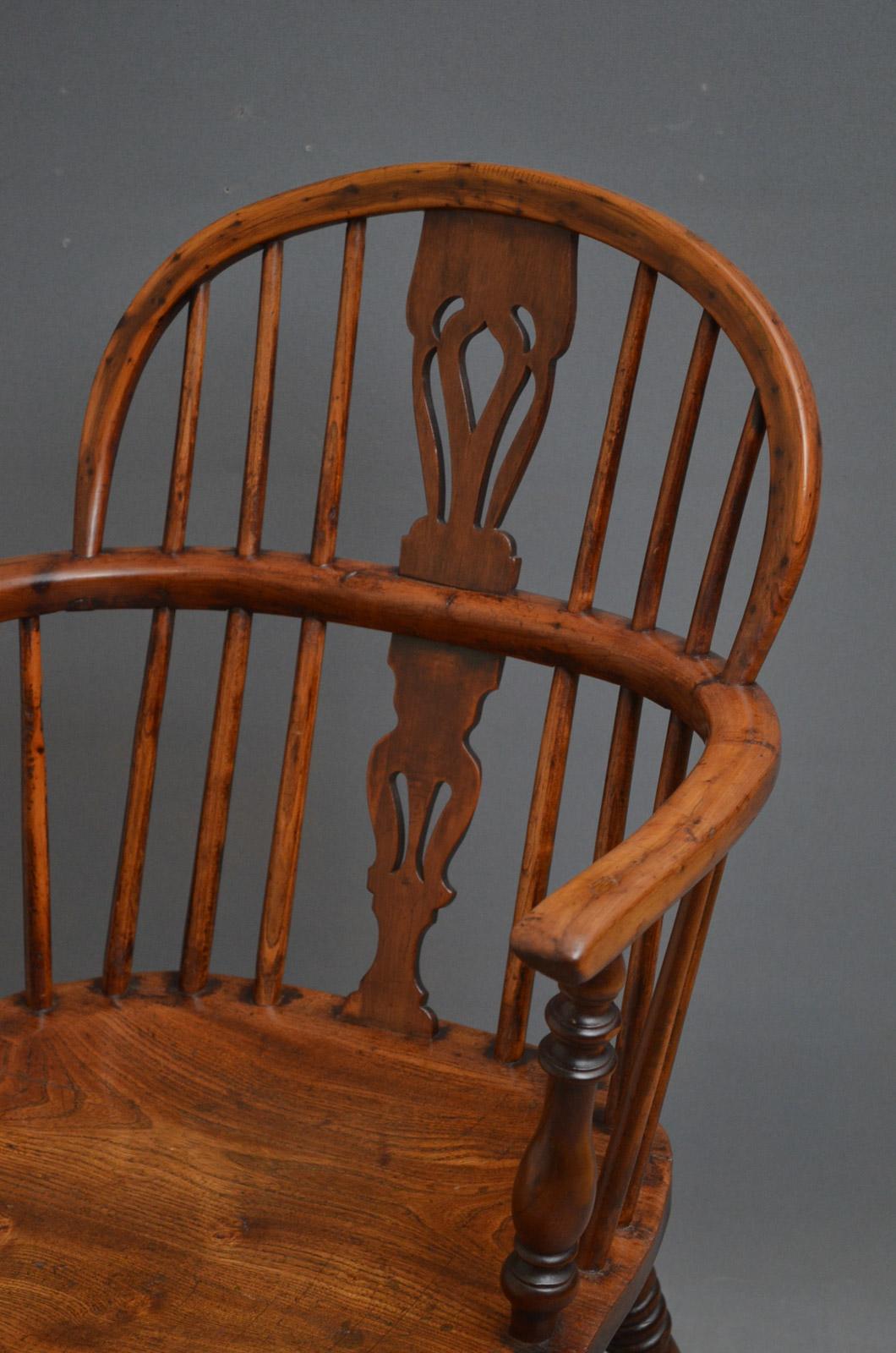 Sn3224, early Victorian, yew wood and elm, low back windsor chair with fretted central splat to back, standing on turned, ringed legs united with stretchers, all in original condition throughout, ready to place at home, circa 1850
Measures: H 17