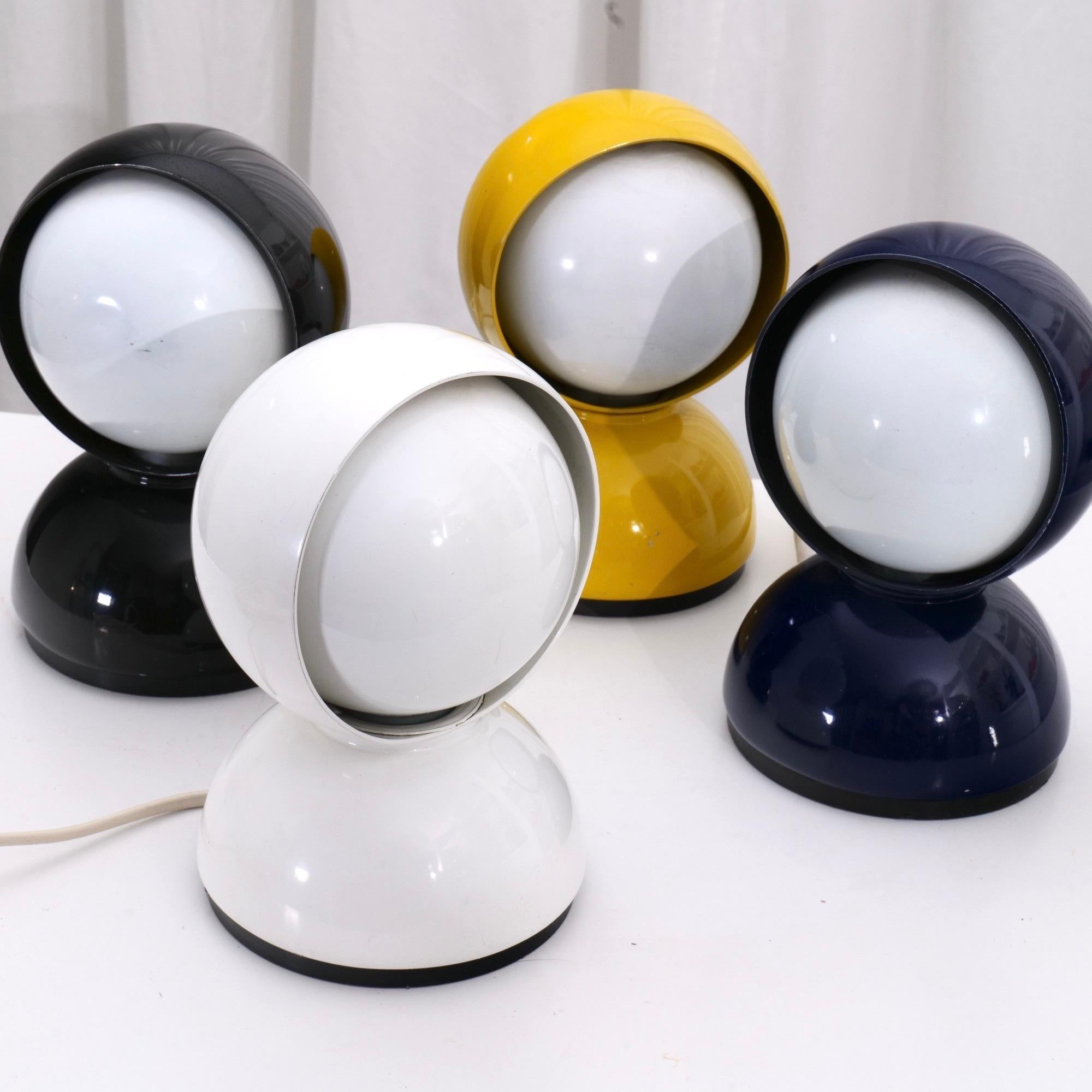 collection of 4 lamps in 4 rare and most desirable colours:
black, blue ,white , yellow

Original vintage designer lamps by Vico Magistretti for Artemide - Italy.
Design Award lamps designed by Vico Magistretti 1965.
Compasso D'Oro design