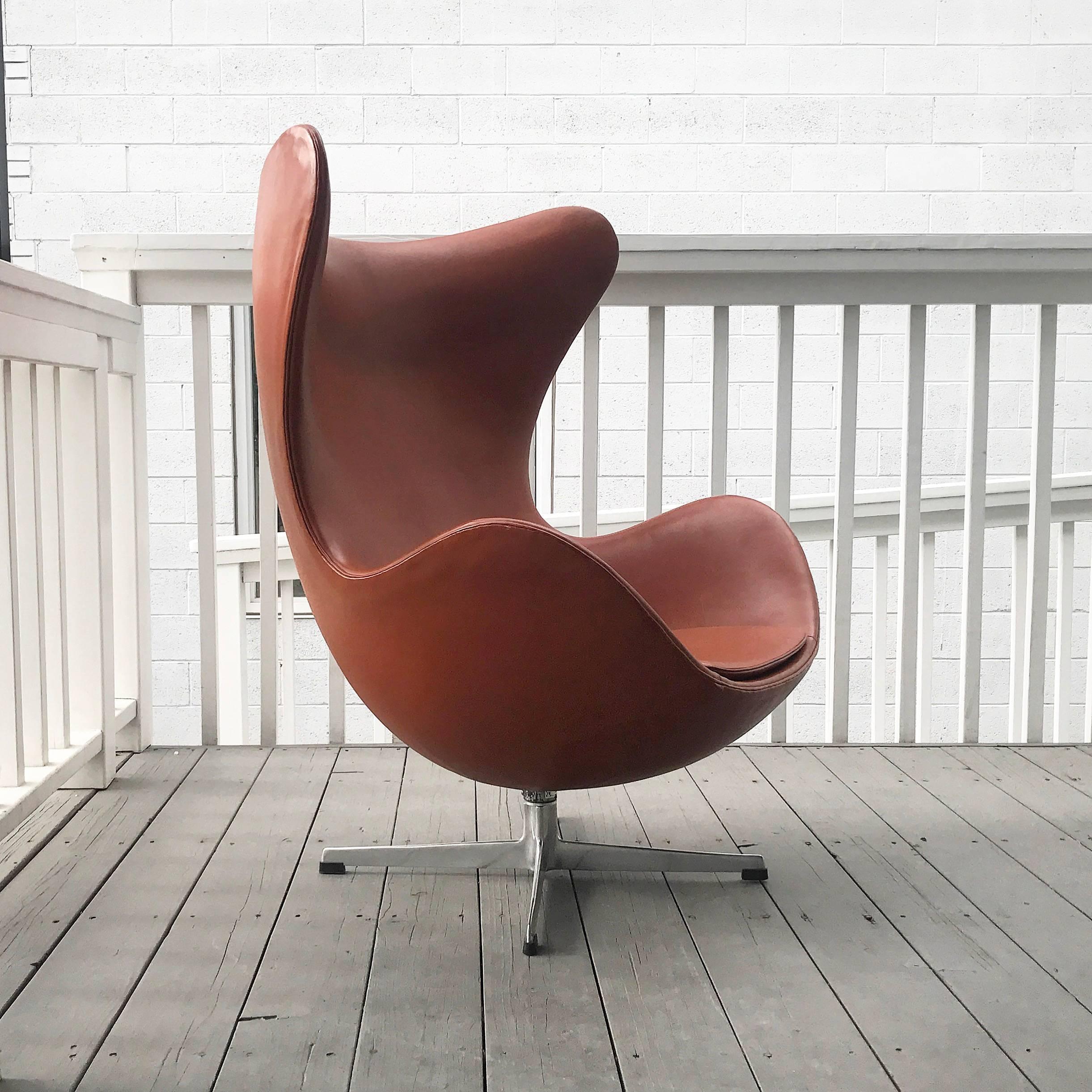 All original Egg chair in its original leather 
great vintage condition 
came from the estate of the marcus' from Neiman Marcus.
 