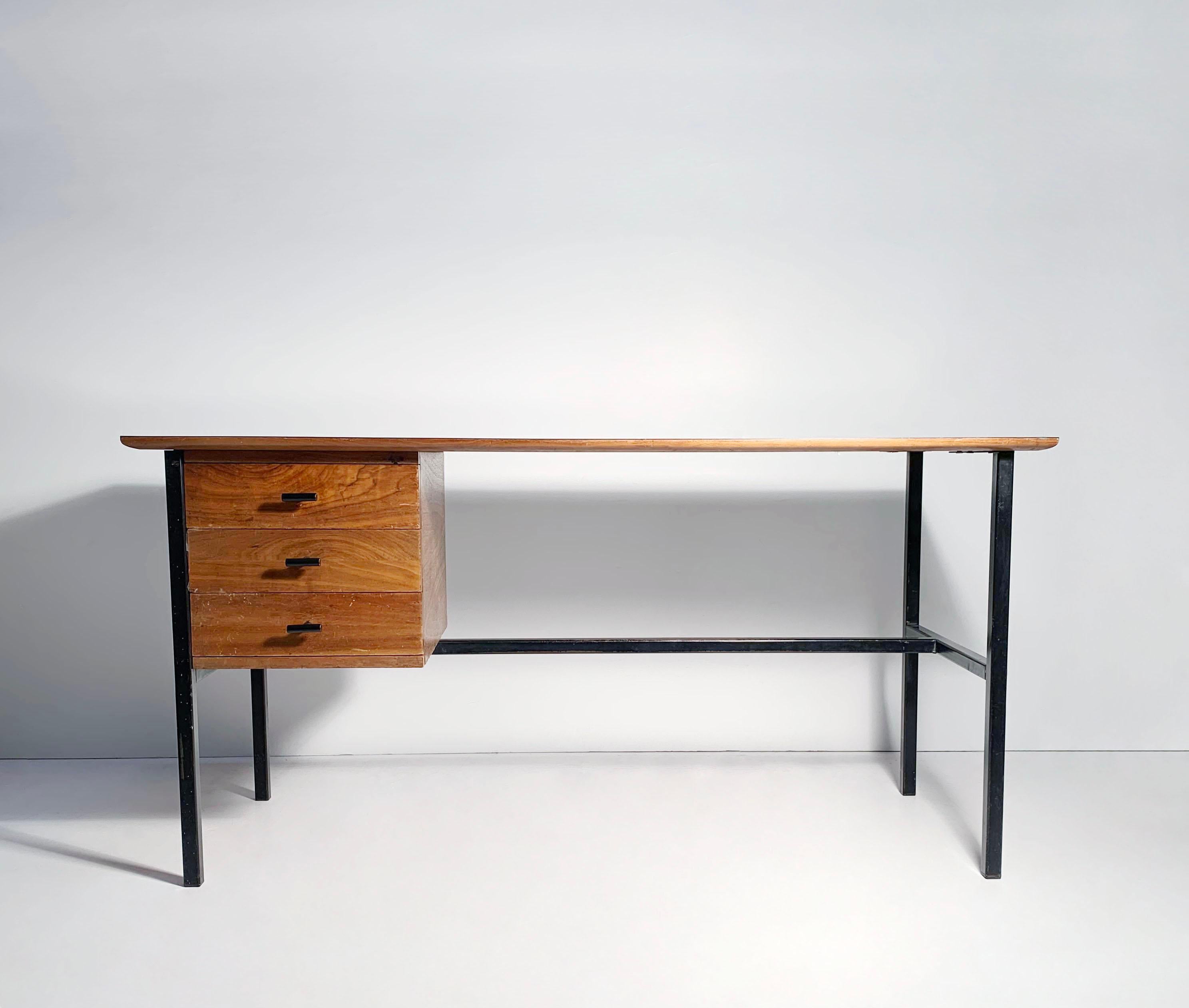A nicely proportioned vintage desk attributed to Thonet. A more unusual size to find. More Slim.
Faux wood grain laminate top. Could possibly be edited with a sheet of wood veneer.

In the manner of Florence Knoll and Pierre Paulin