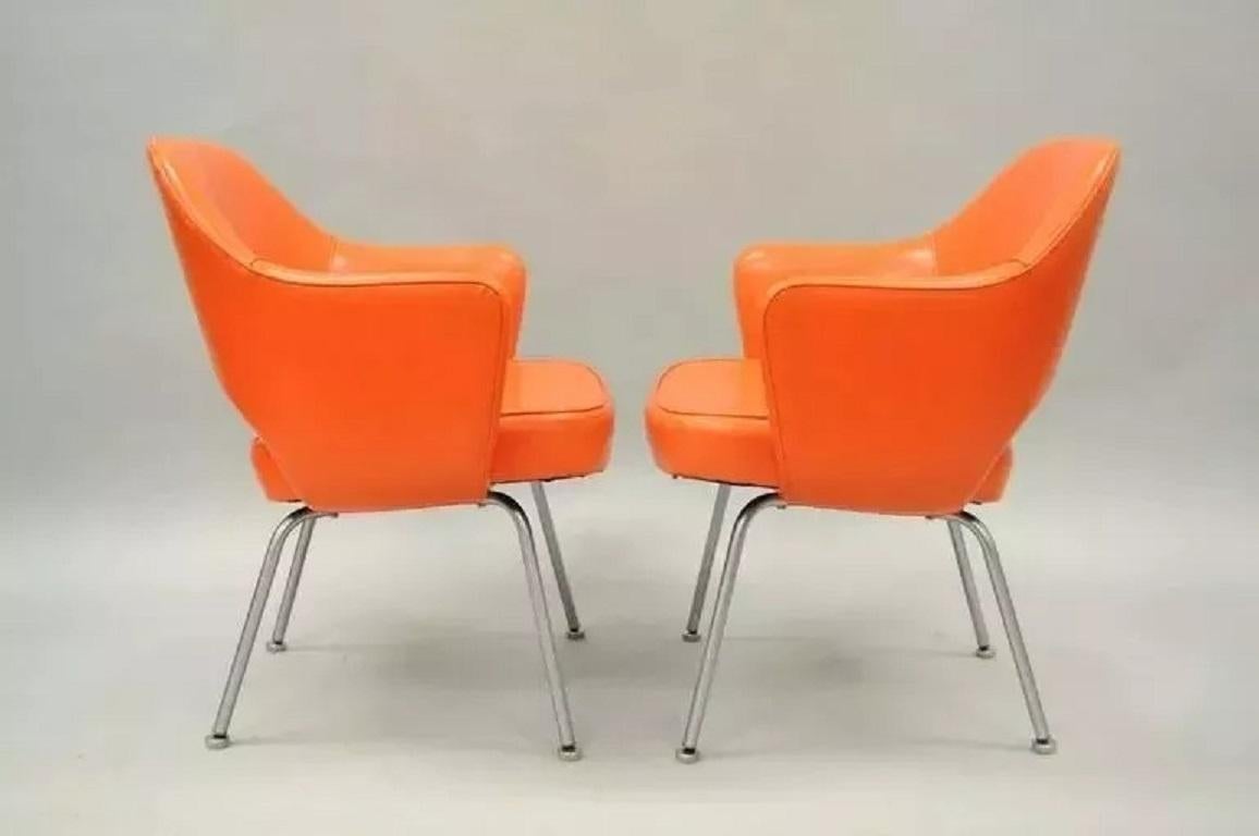 Mid-Century Modern Early Vintage Eero Saarinen for Knoll Orange Vinyl Executive Arm Chairs - a Pair For Sale