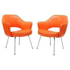 Early Vintage Eero Saarinen for Knoll Orange Vinyl Executive Arm Chairs - a Pair