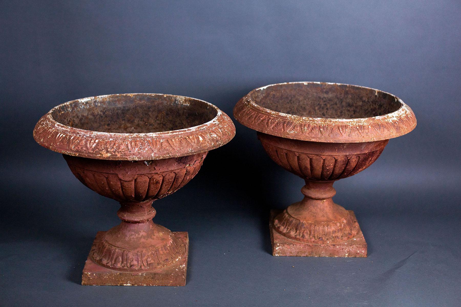 For your consideration, fleurdetroit presents this pair of cast iron garden urns from the early twentieth century. Fresh from an East Coast Estate, these charming urns have lived a life of privilege and are now looking for another impressive address
