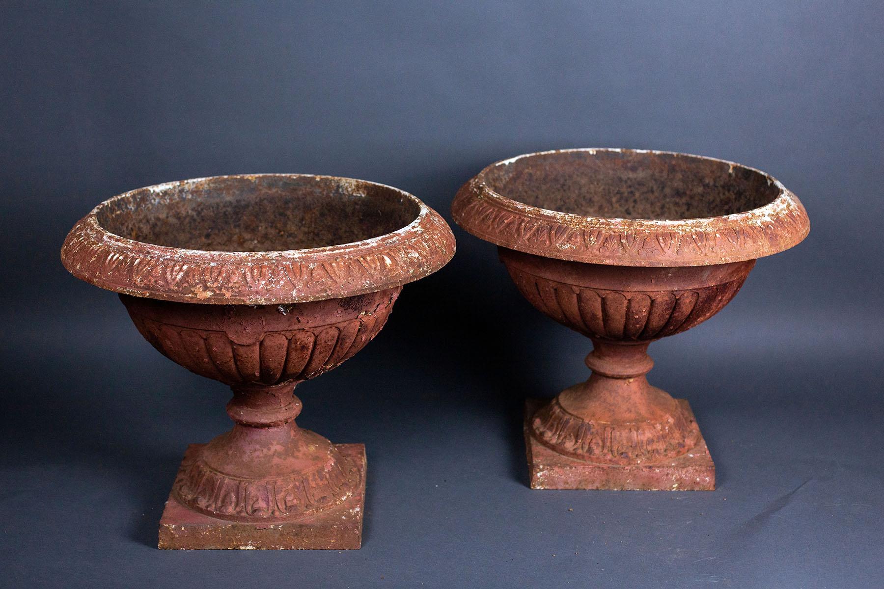 Cast Early Vintage Iron Urns on Plinths 'Pair' For Sale