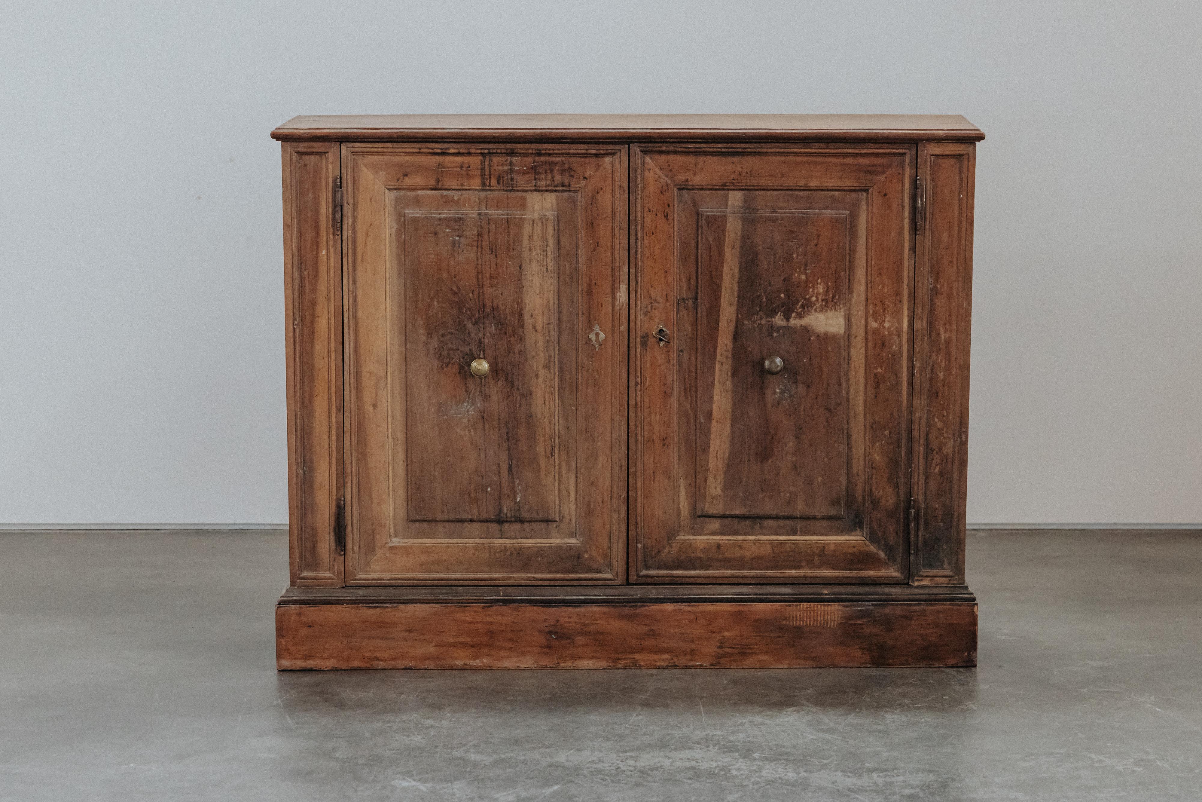 Early Walnut Cabinet From Italy, Circa 1800.  Solid walnut construction with original hardware.  Fantastic original patina and use.