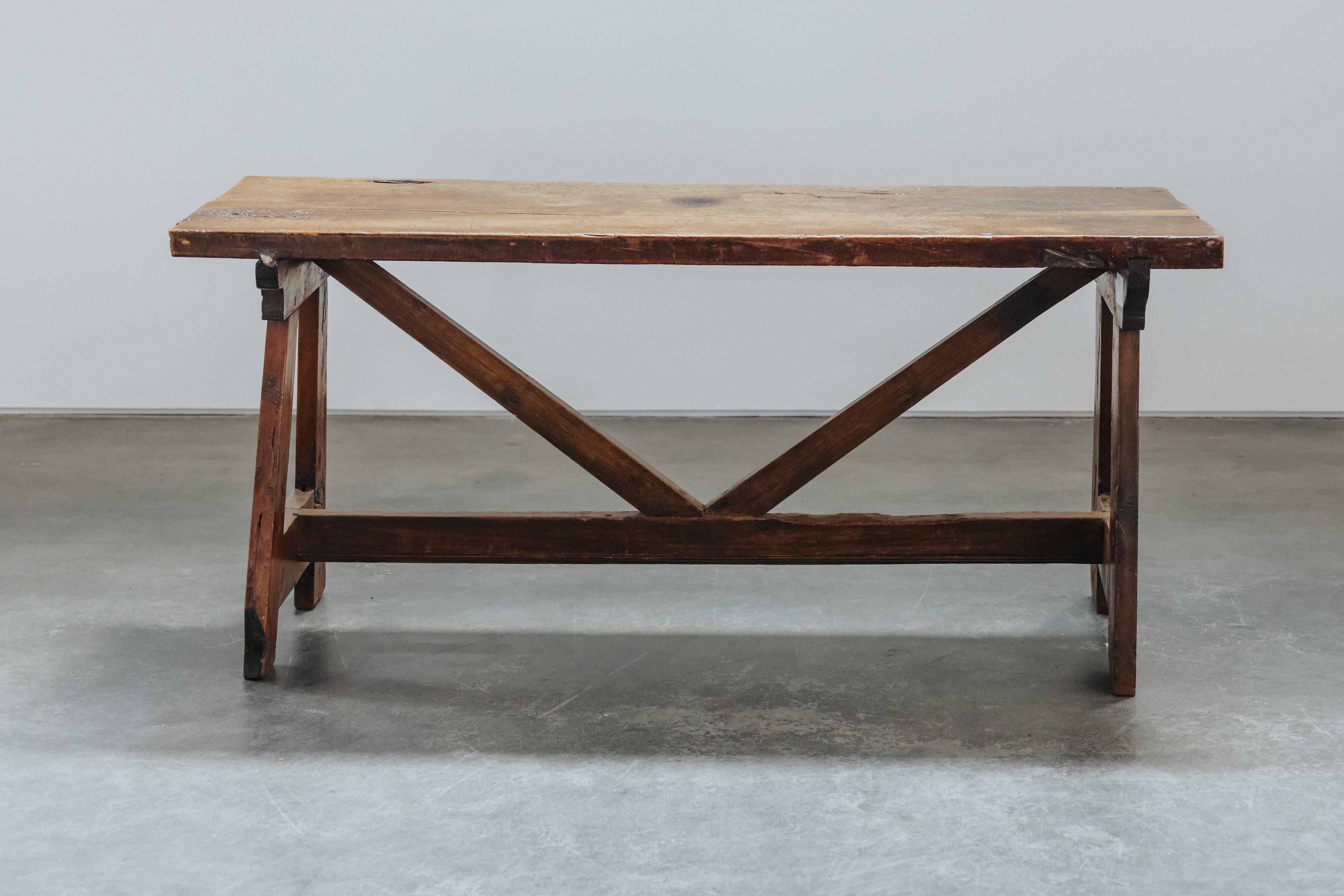 Early Walnut Console Table From Italy, Circa 1850.  Solid walnut construction with superb use and patina.