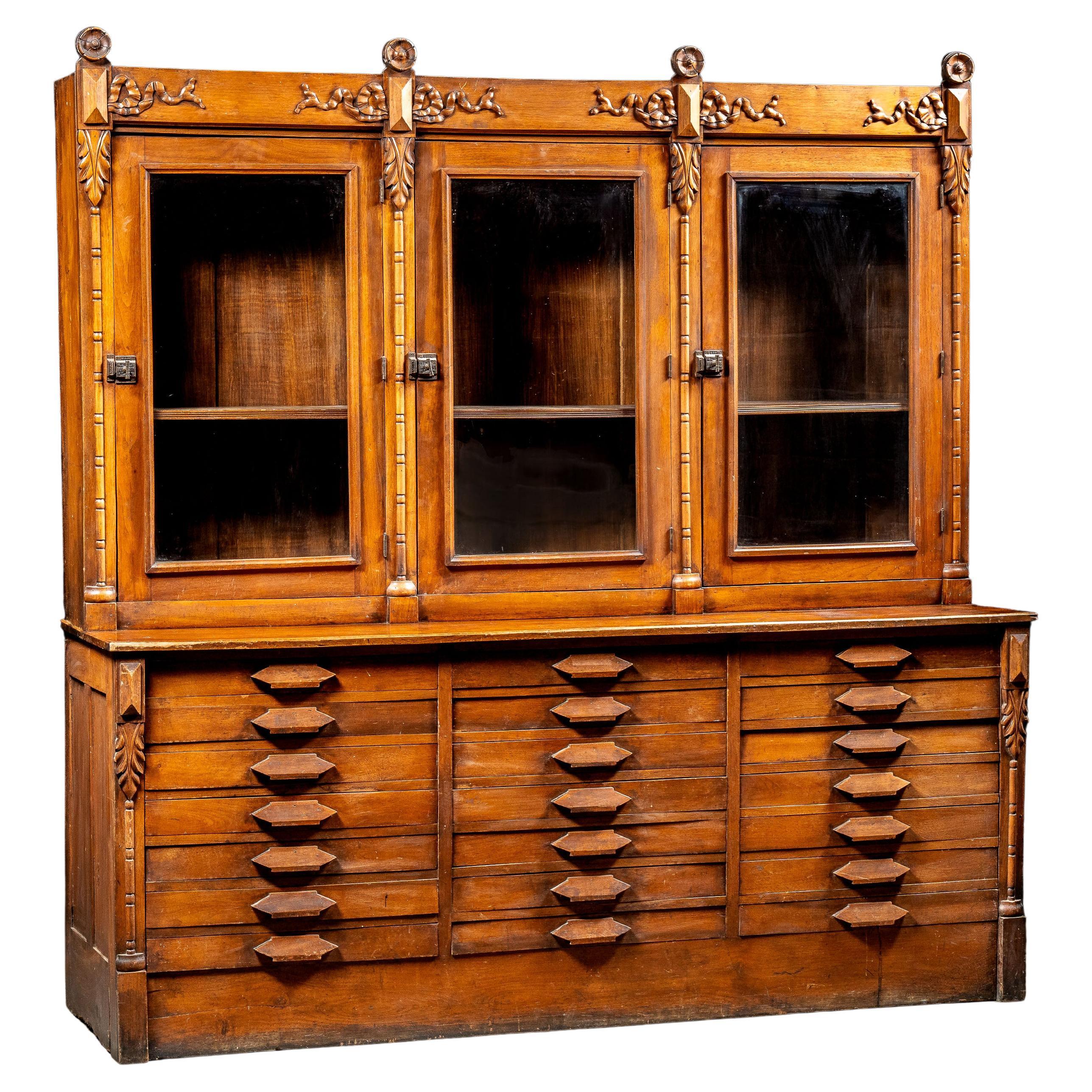 Early Walnut Step-Back Apothecary Cabinet