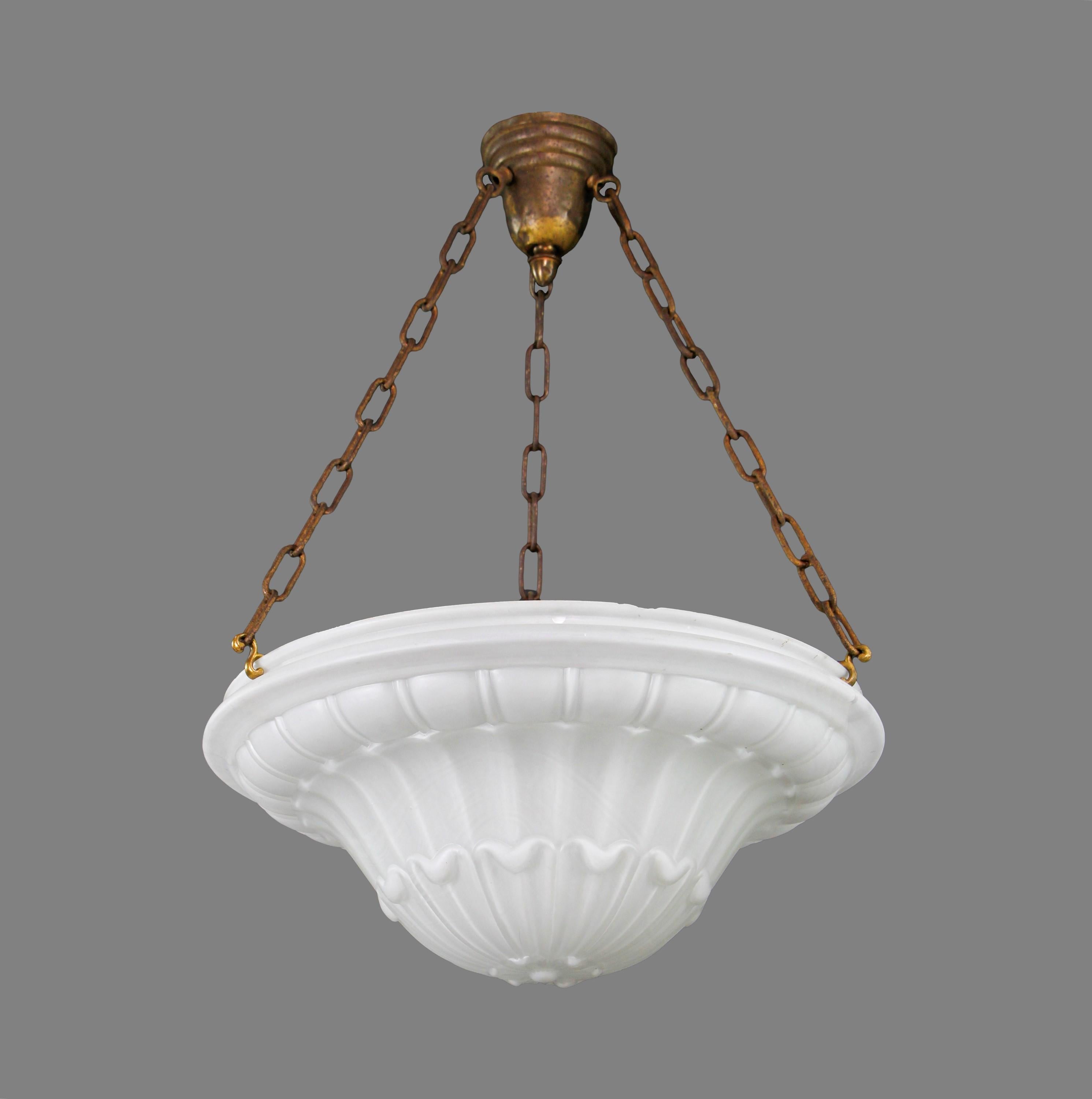 Early 20th century pendant light. Features a white glass dish light shade with three steel chains and a brass canopy. Shade has some chips along the outside edges. Please see photos. Please note, this item is located in our Scranton, PA location.