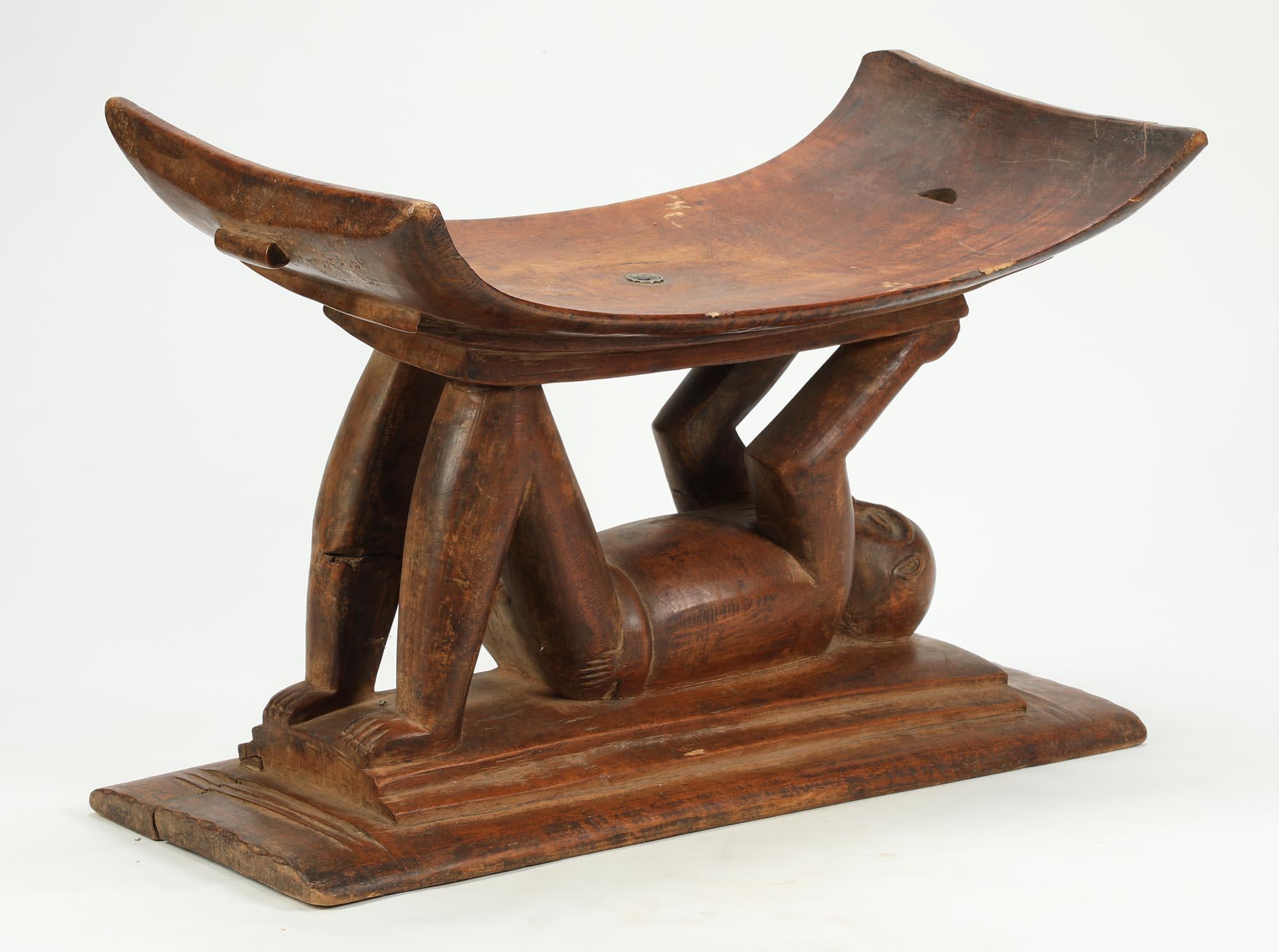 The supports for Akan stools take many forms, they can be purely geometric or architectural with simple posts and columns, or, as in this case, figural, with humans or animals supporting the curved seat.
Created in the early to mid-20th century, by