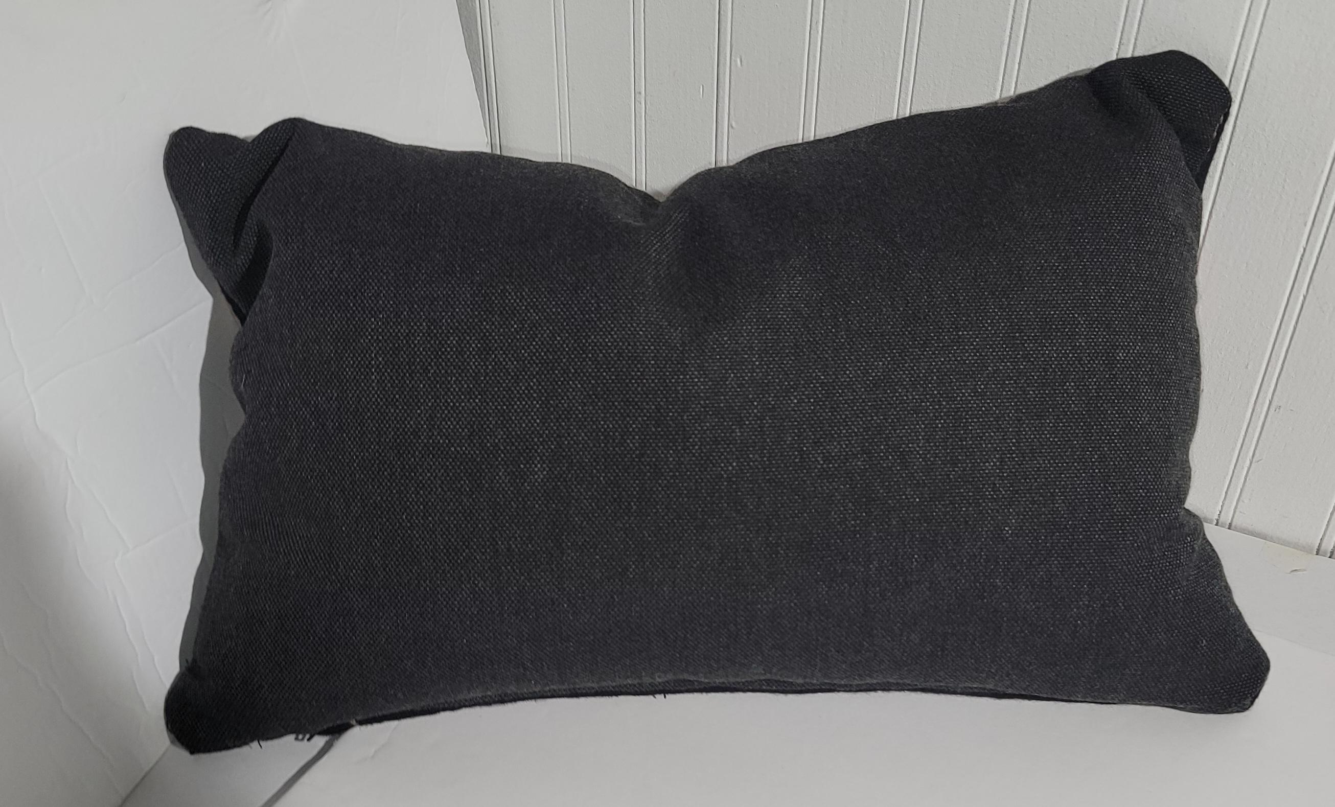 Great modernistic German-Town pillow. Deep grays and a color pallet that give off a great sense of color and design. A beige center eye with red border. Beautiful red striped give more color to this pillows design.