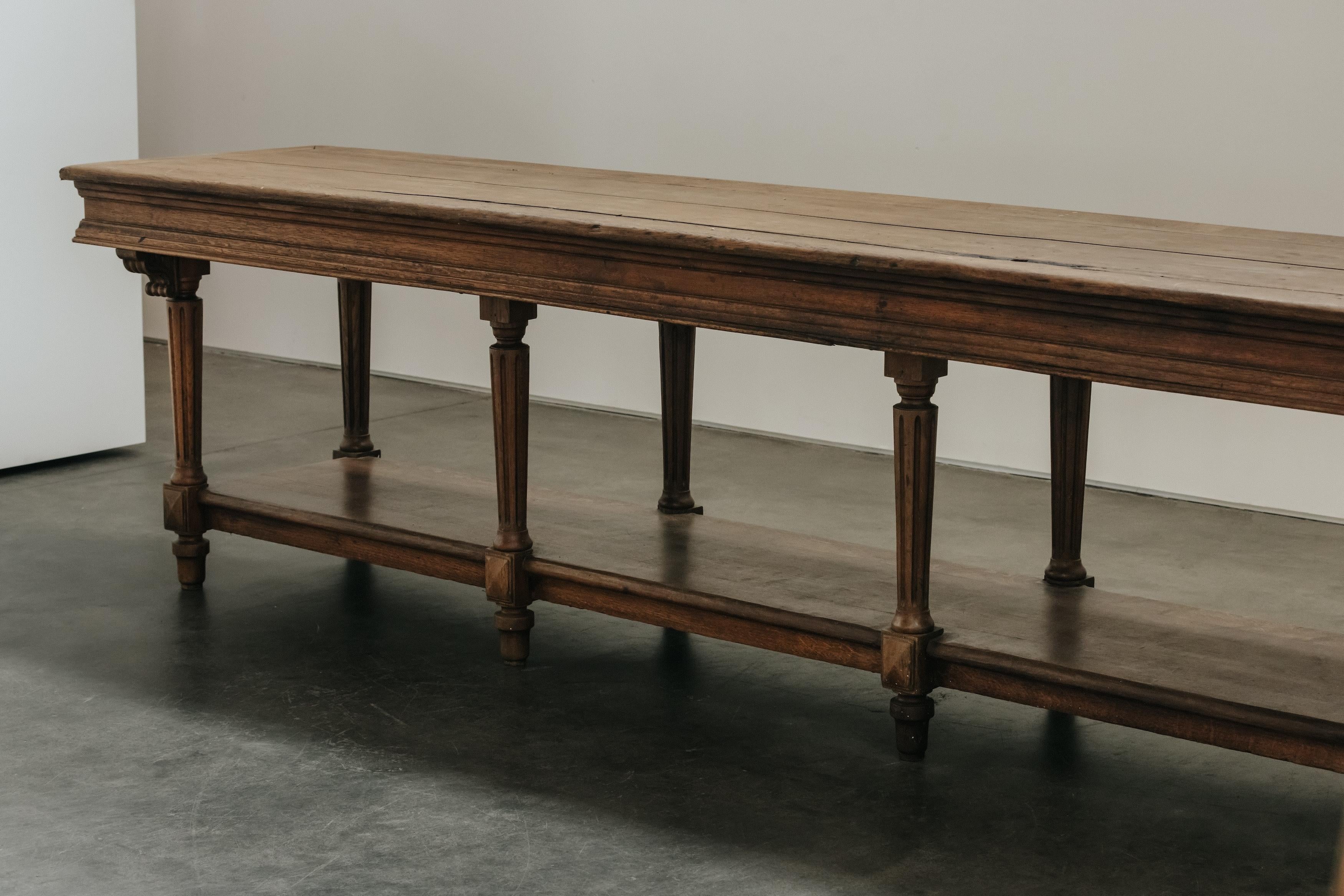 Early XL Oak Draper Table From France, Circa 1900.  Solid oak construction with original hardware.  Great patina and use.