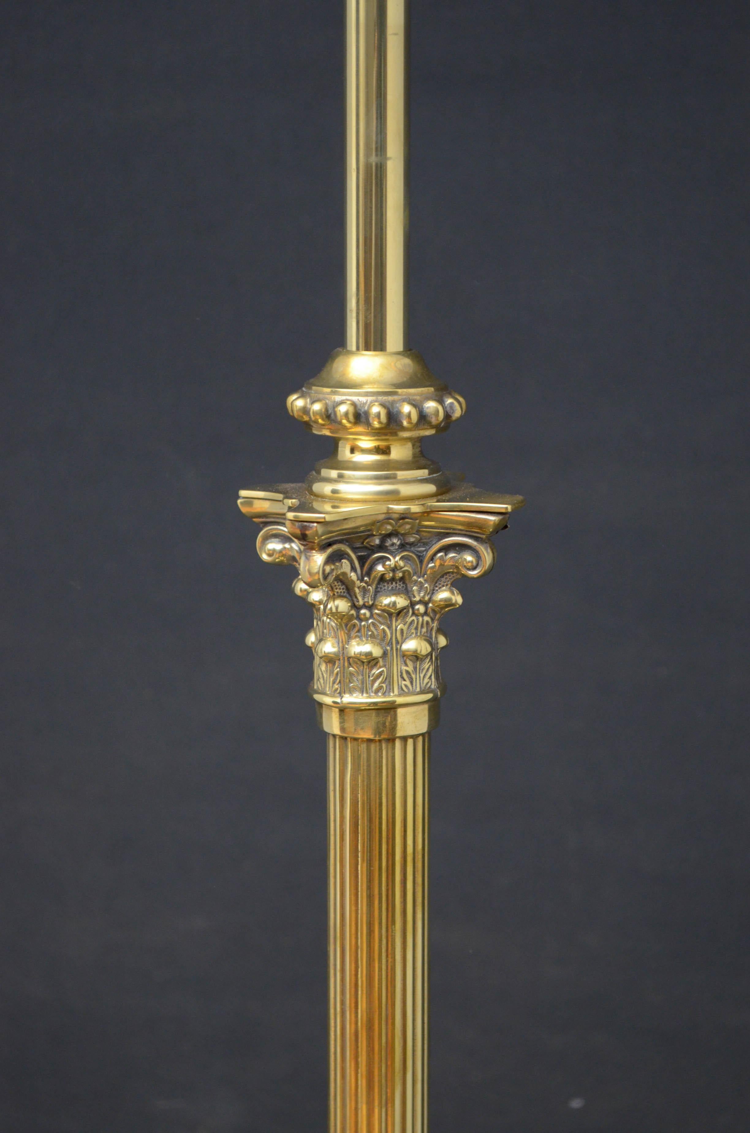 Sn4669, brass, height adjustable, standard lamp, having fluted Corinthian column, stepped base and paw feet. This antique lamp has been pat tested and is ready to place at home. Lampshade not included, circa 1910.

Measures: H 51-65? W 13.5? x D
