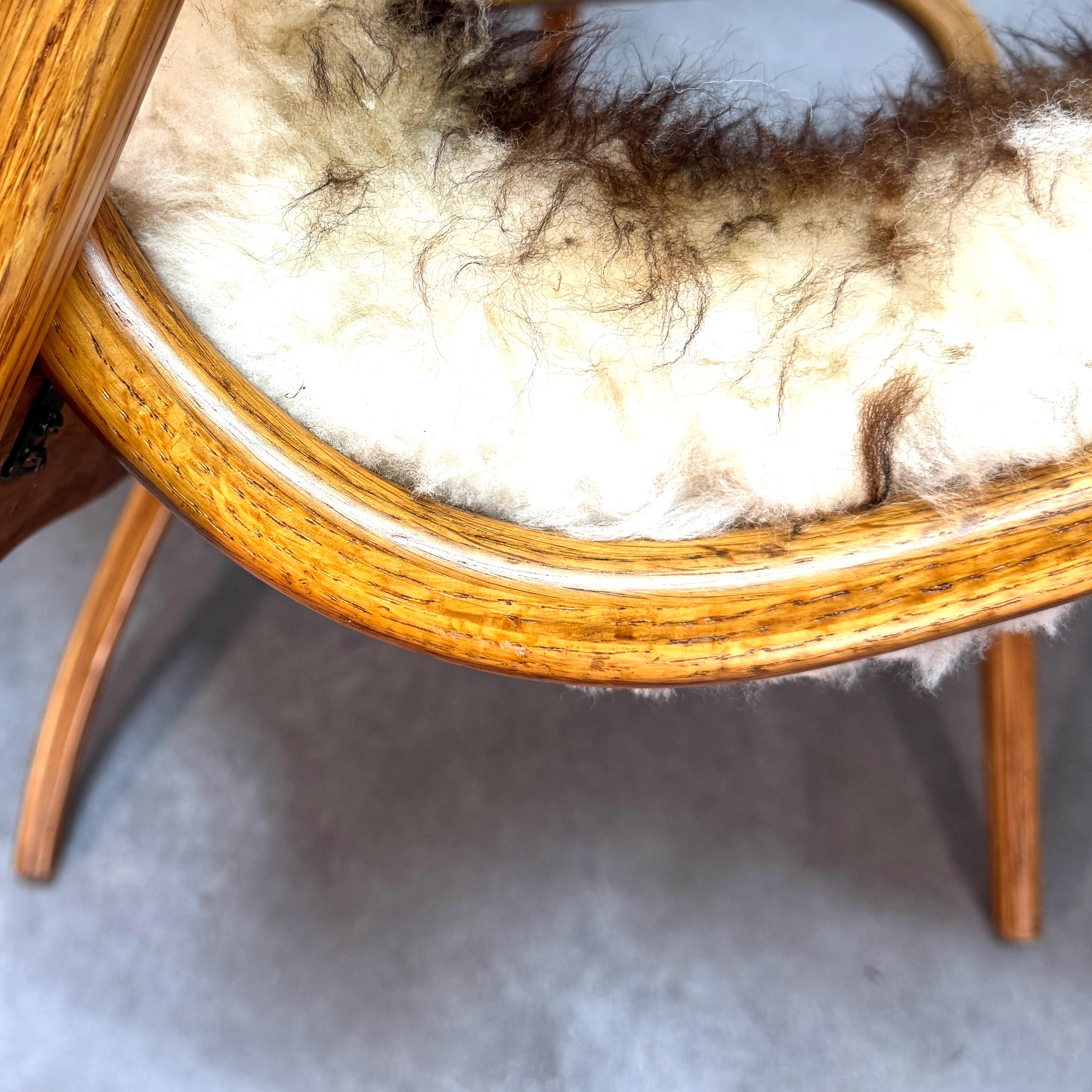 Sheepskin Early Yngne Ekstrom oak Lamino armchair & ottoman for Swedese Denmark, 1960's. For Sale