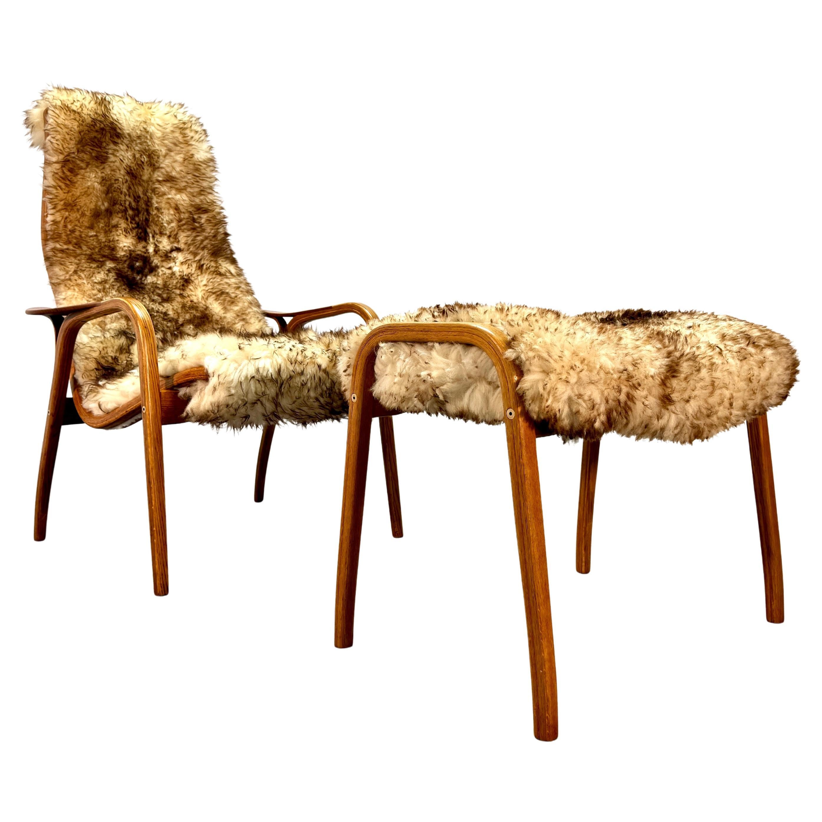 Early Yngne Ekstrom oak Lamino armchair & ottoman for Swedese Denmark, 1960's. For Sale
