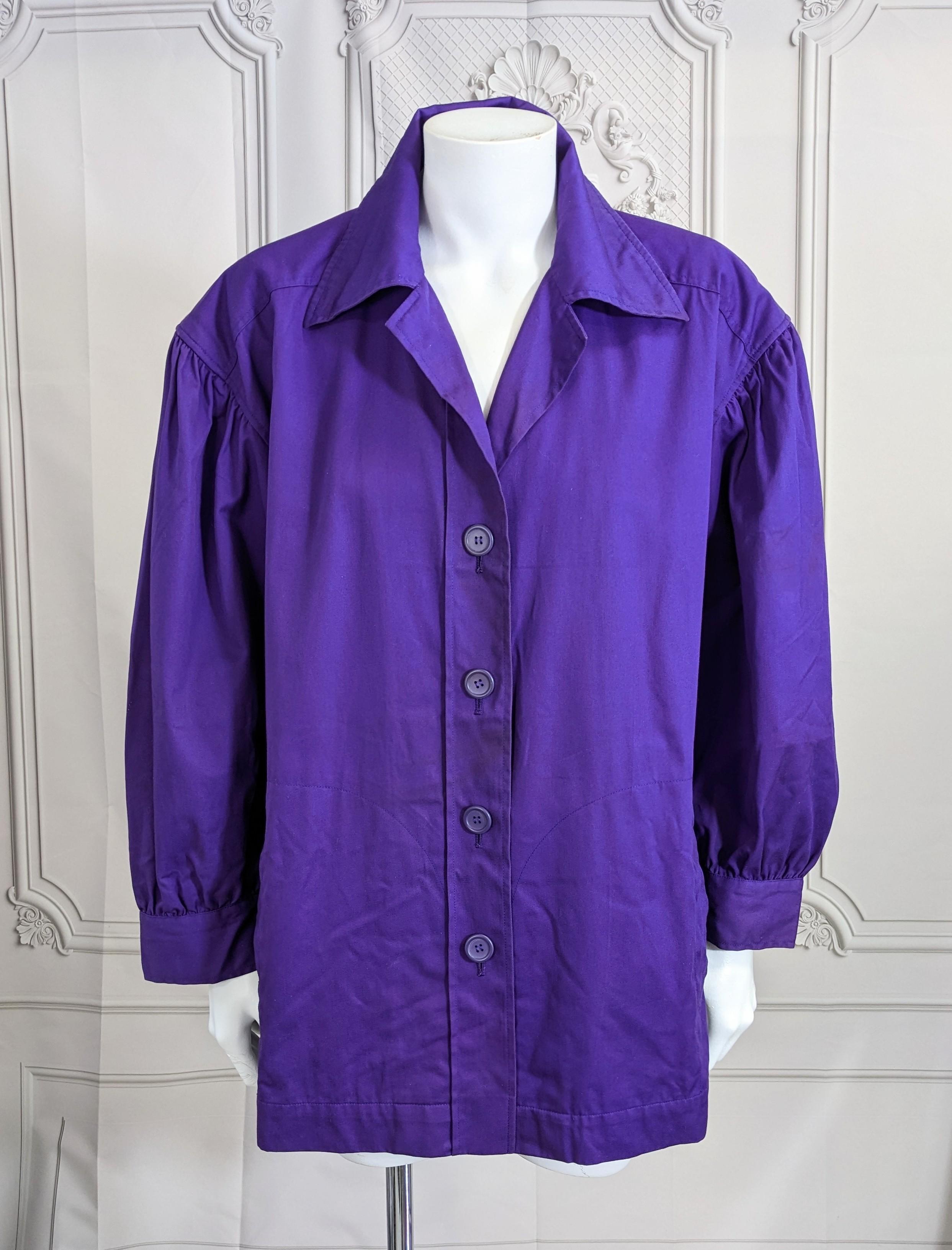 Early Yves Saint Laurent Violet Cotton Twill Jacket from the 1970's. French workwear reimagined by St. Laurent with puffy sleeves, slash pockets and vibrant color. Works well belted as well. Lightweight cotton twill in a vibrant purple-blue. Size 34