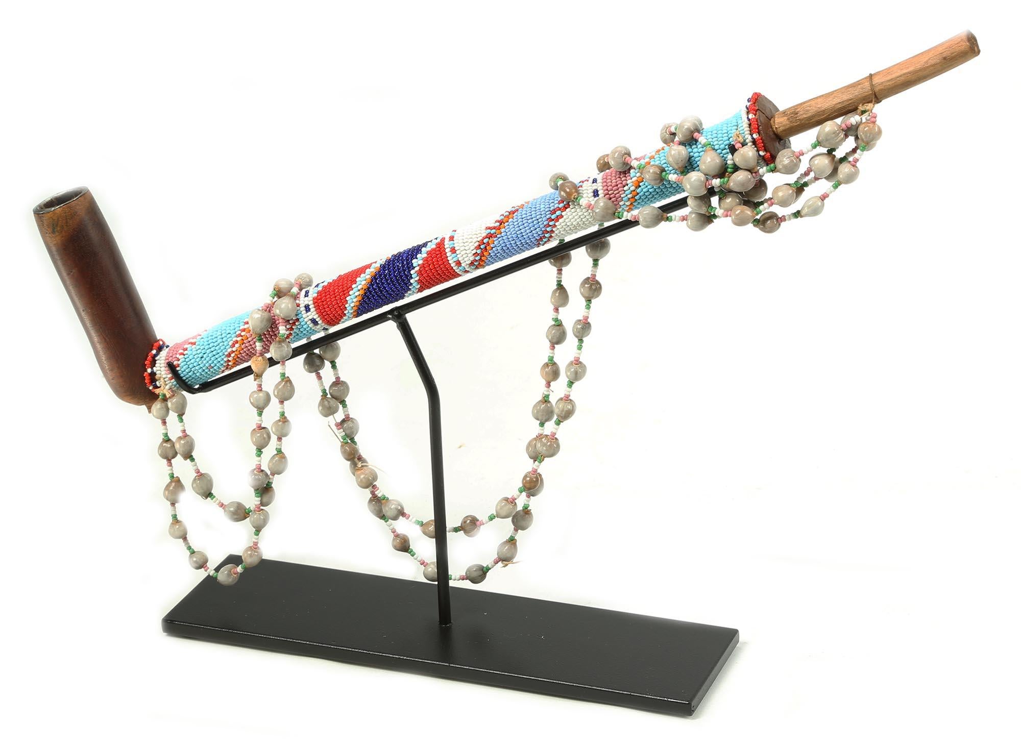 South African Early Zulu Carved Wood Pipe with Beaded Stem and Strap on Stand South Africa For Sale