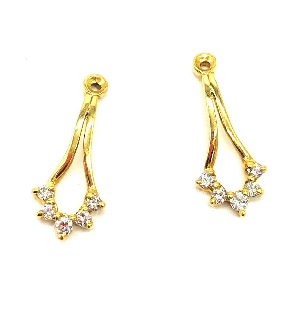 Earring Jackets, Diamond .40 Carat
 Drop any stud earring into these contemporary diamond Jackets consisting of (10) round brilliant cut diamonds measuring 2.10 mm with a total weight of estimated .40 carat. Quality are VS-SI1 clarity and H-I color