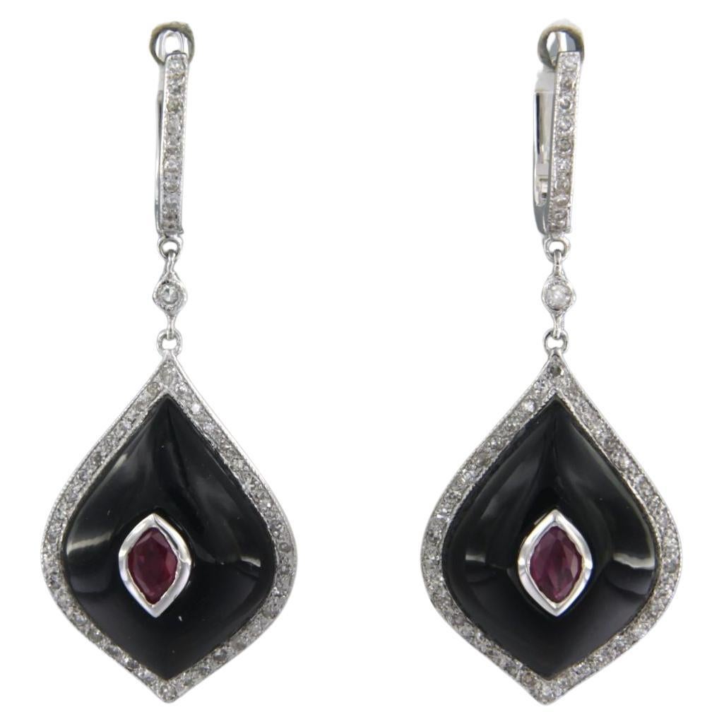 Earring set with onyx, ruby and diamonds 14k white gold
