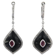 Earring set with onyx, ruby and diamonds 14k white gold