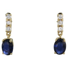 Earring set with sapphire up to 1.50ct and diamonds up to 0.24ct 18k yellow gold