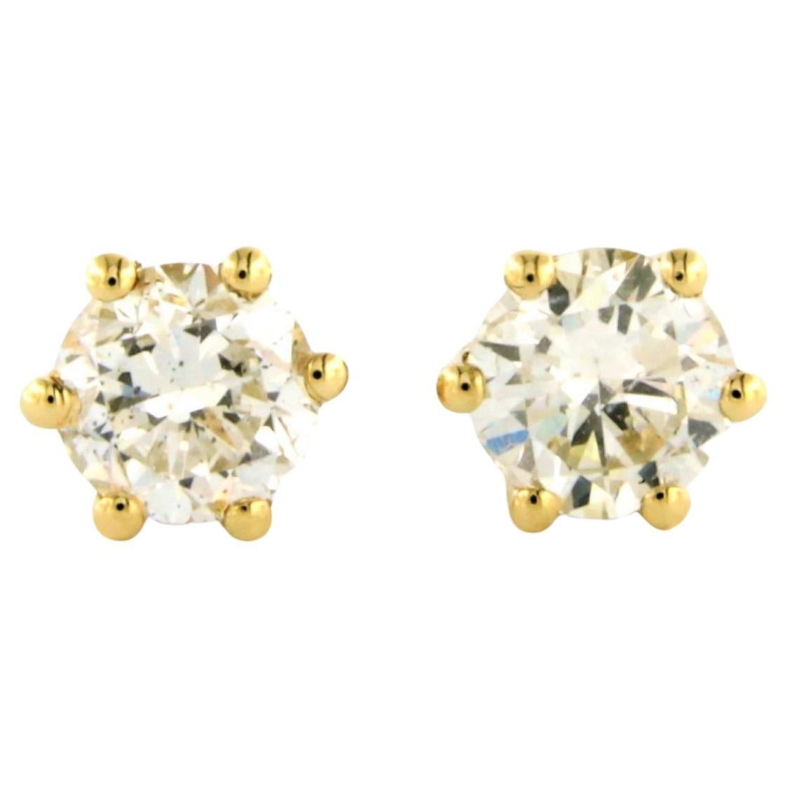 Earring studs set with diamonds in total 1.44ct 14k yellow gold