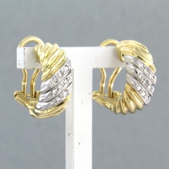 Earring with brilliant cut diamonds up to 0.18ct 8.5 grams 18k bicolour gold