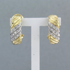 Pendiente con diamantes talla brillante hasta 0,18ct 8,5 gramos Oro bicolor 18k