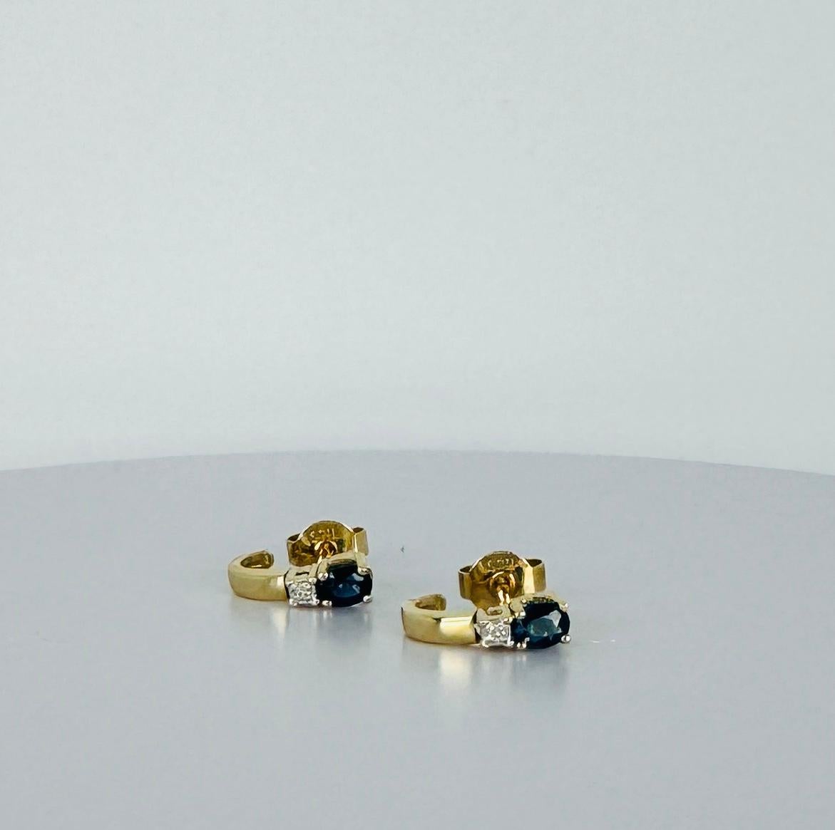Brilliant Cut Earrings 14 carat gold with blue sapphire and brilliant cut diamonds For Sale