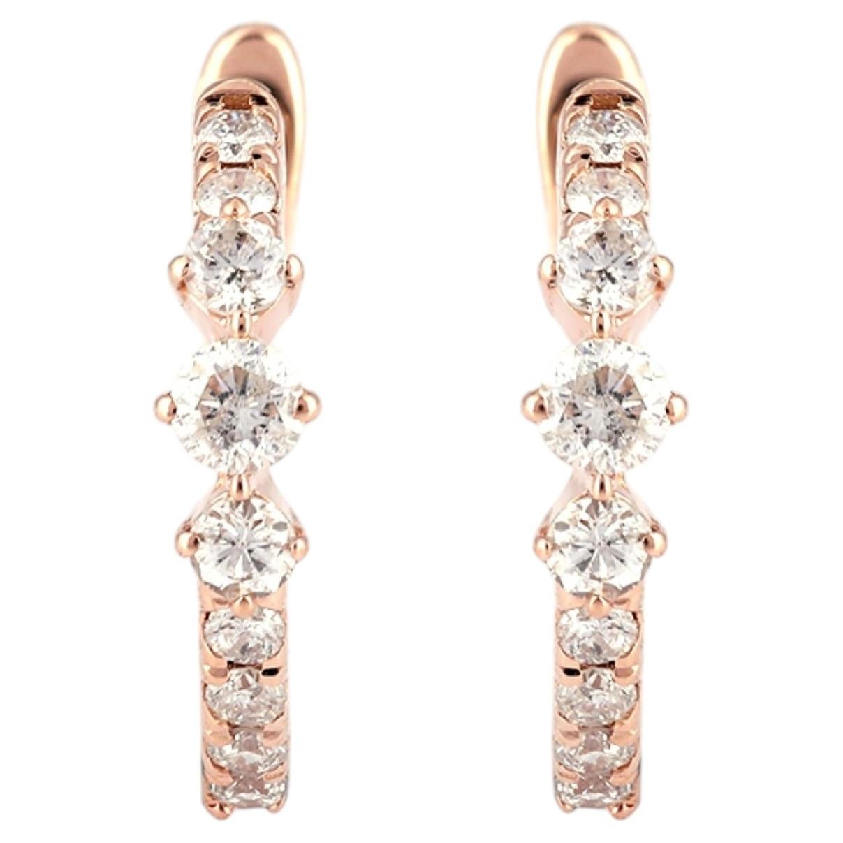 Pendientes de aro tipo «huggie» de oro rosa de 14 quilates con diamantes de distintos tamaños