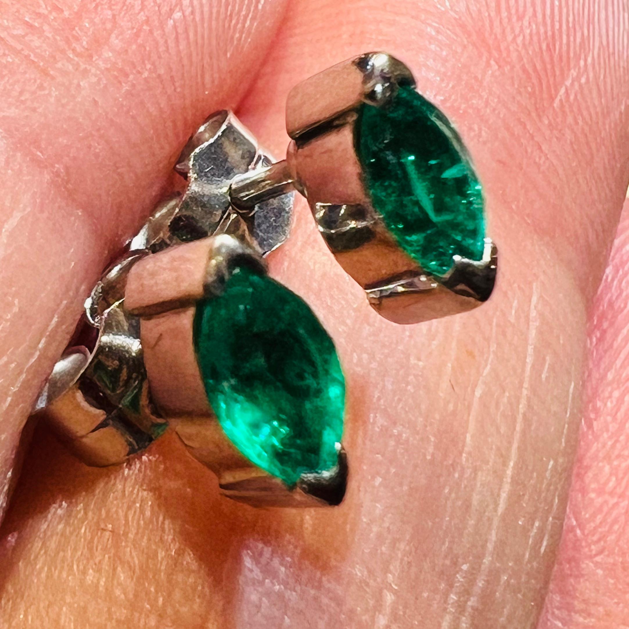 Pair of 18K white gold earrings for pierced ears (stalks and pushers)
set with two marquise-cut Colombian emeralds,
of a beautiful bluish-green, typical of Colombian emeralds,
The emerald's natural inclusions can be seen with a magnifying glass.