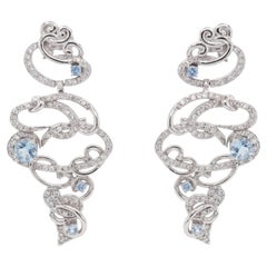 Boucles d'oreilles Pradera en or blanc 18 carats, ornées de diamants et de topazes rondes