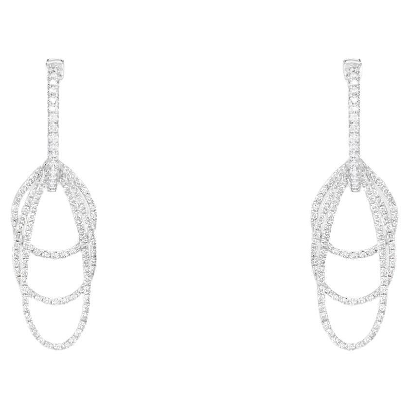 Boucles d'oreilles pendantes en or 18kt avec diamants