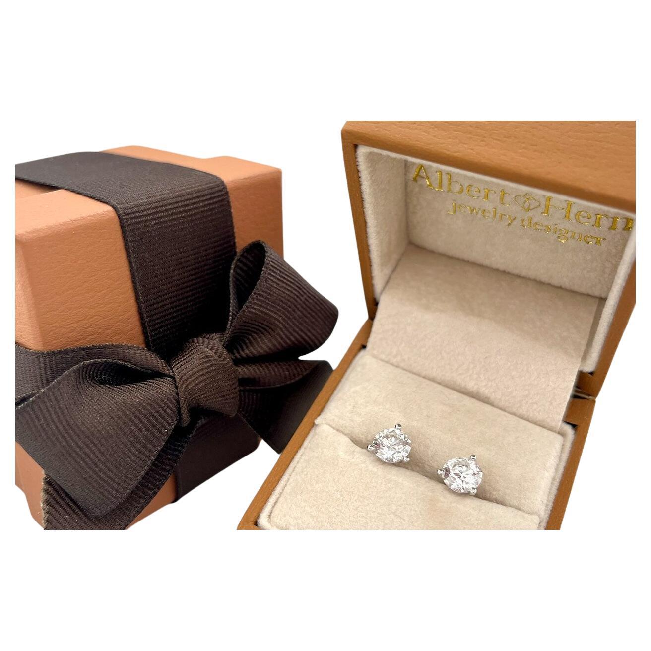 Experience the pinnacle of luxury with 3.00 carats of GIA-certified Natural Round Diamonds (Color I, Clarity VS2) set in timeless Platinum Studs. These 3 Prong earrings are crafted to capture light from every angle, ensuring a radiant presence.