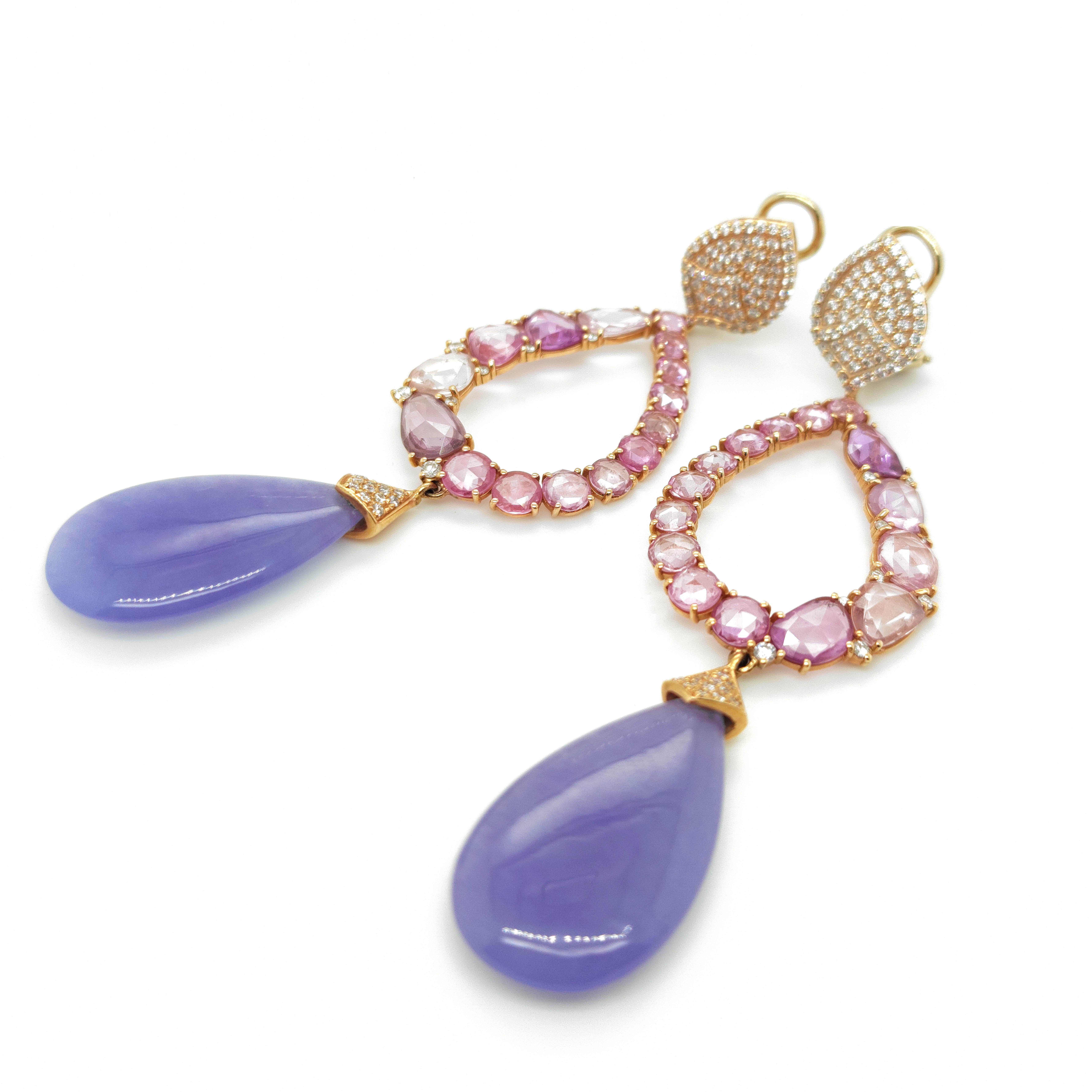 Dazzle in the ethereal beauty of our Earrings Arcobaleno, a mesmerizing fusion of Jade, Sapphires, and Diamonds. Crafted to captivate, these earrings are a symphony of colors, with delicate Lavander Jade stones reflecting a spectrum of hues. The