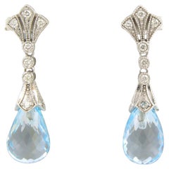 Earrings blue topaz and diamonds 14k yellow gold